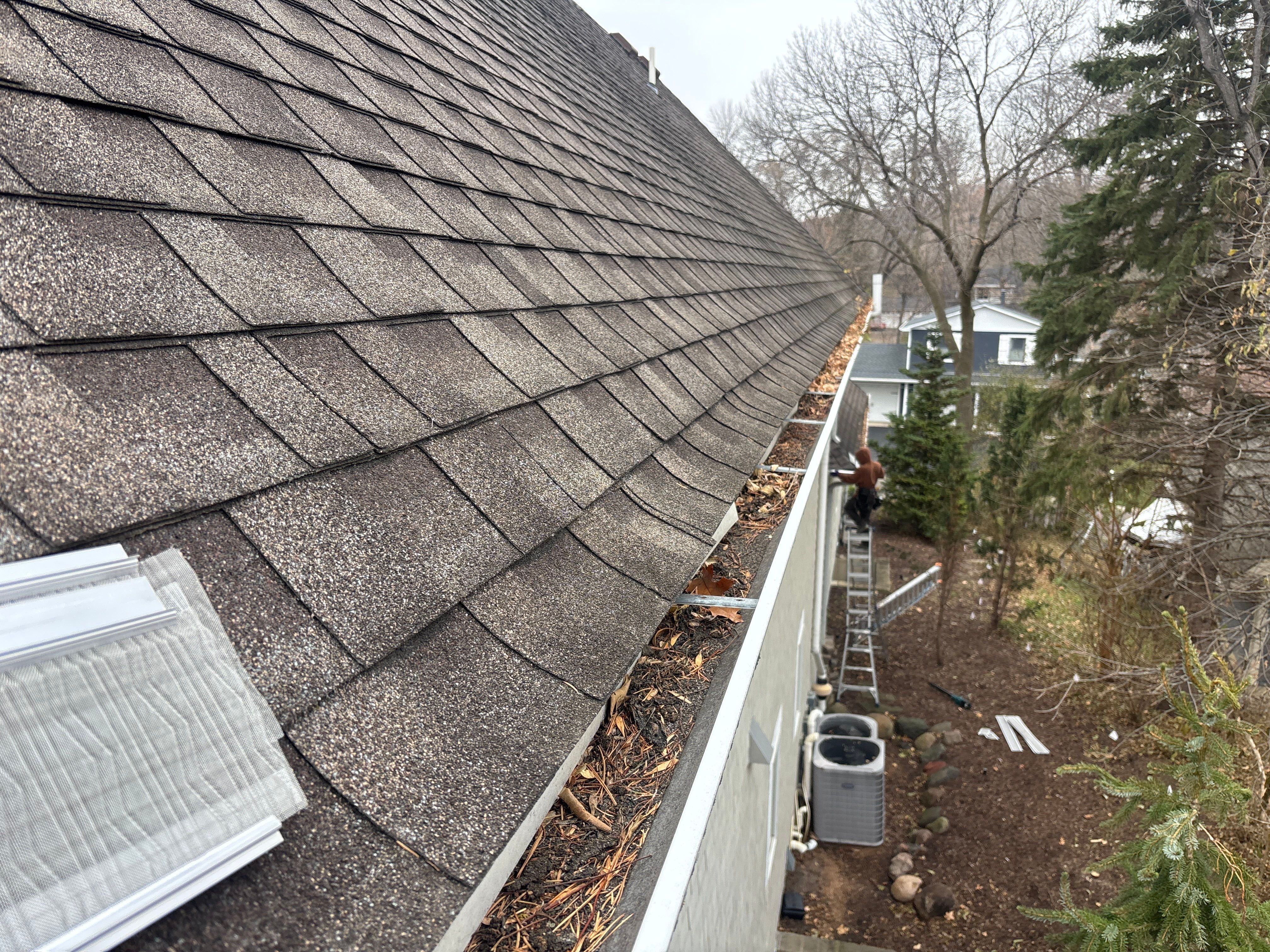 Gutter Cleaning and Leaf Blaster Pro Gutter Guard Installation – Minnetrista, MN by Next Level Seamless Gutters / Exteriors Inc.