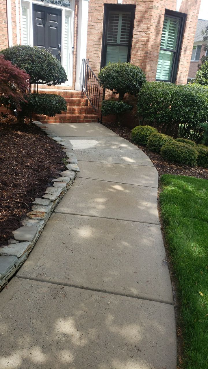 patio cleaning using cleaner by Power Wash Masters LLC