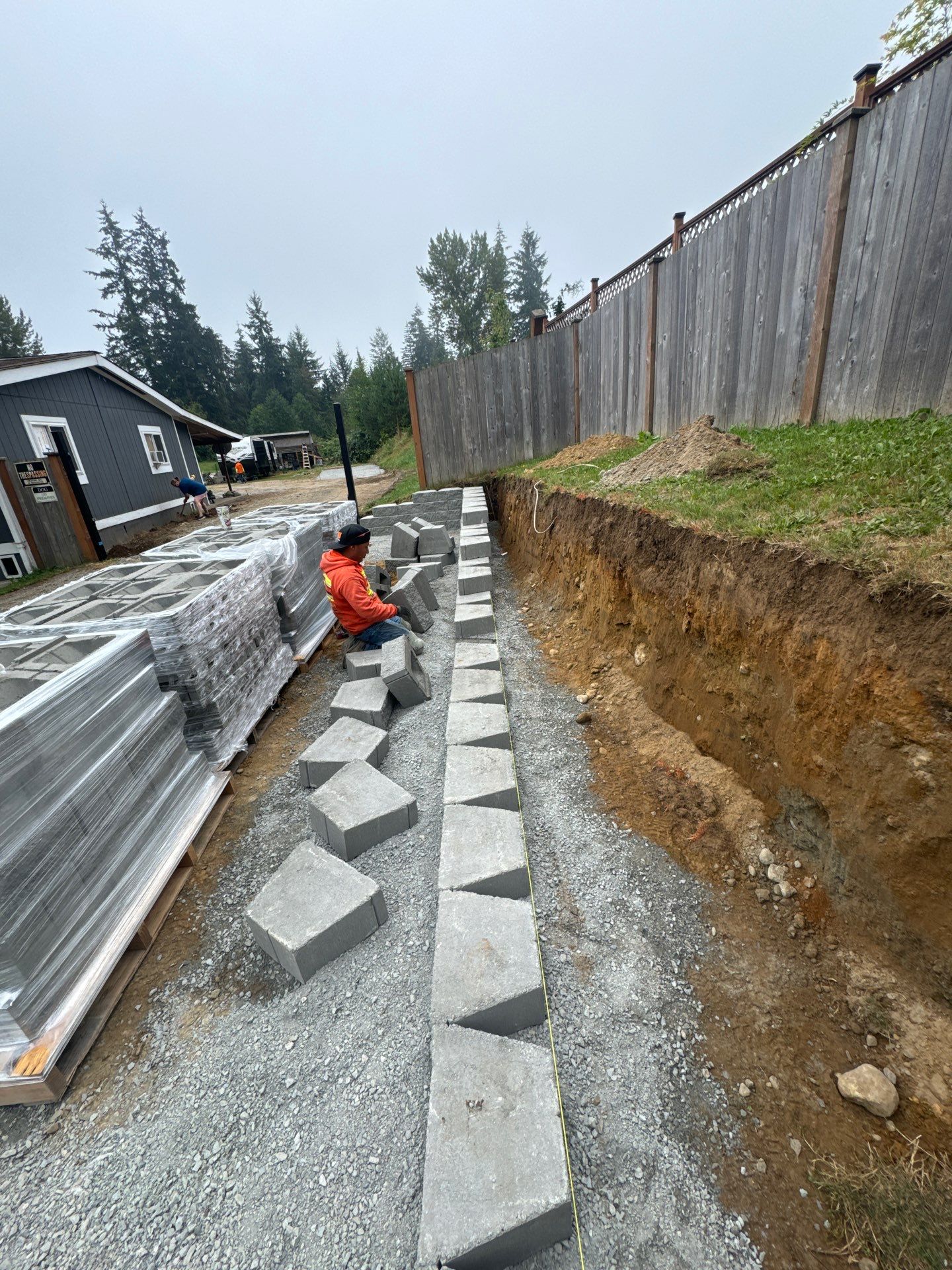 Joann | Asphalt Driveway & Retaining Wall  by Jireh Asphalt & Concrete Inc 
