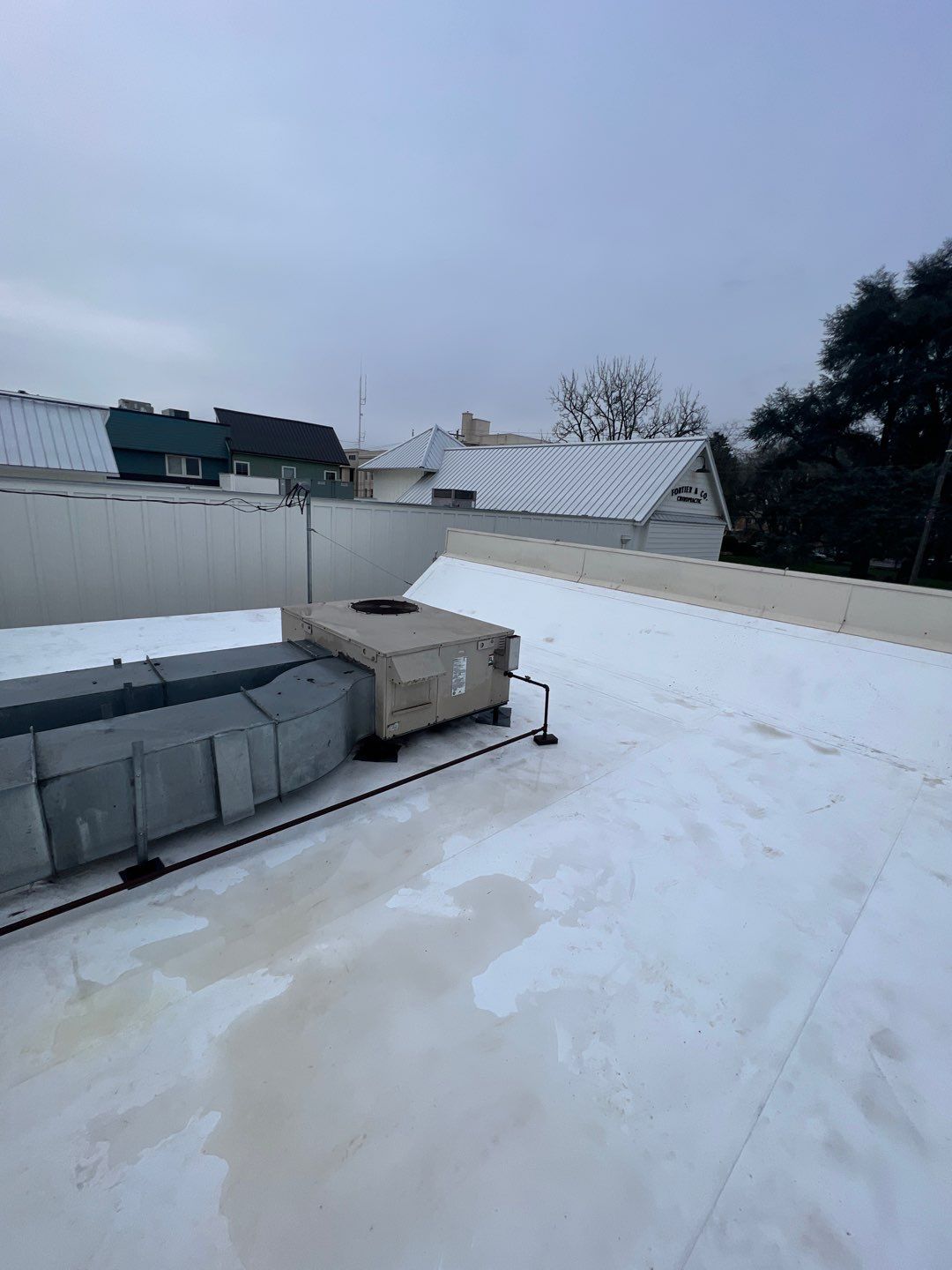 Commercial Flat Roof Installation using GAF 60Mil TPO  by Orezona Building & Roofing Company, Inc.