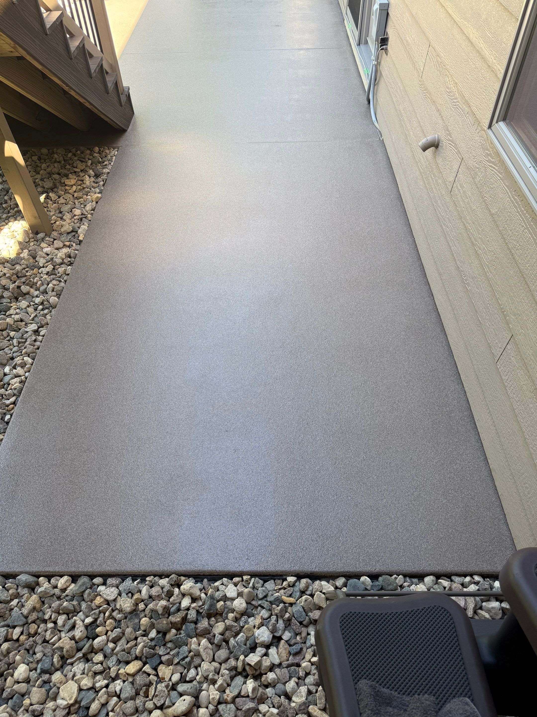 Textured Concrete Coating and Paver Patio Refresh in Sioux Falls by Select Painting, Coatings & Garage Cabinets