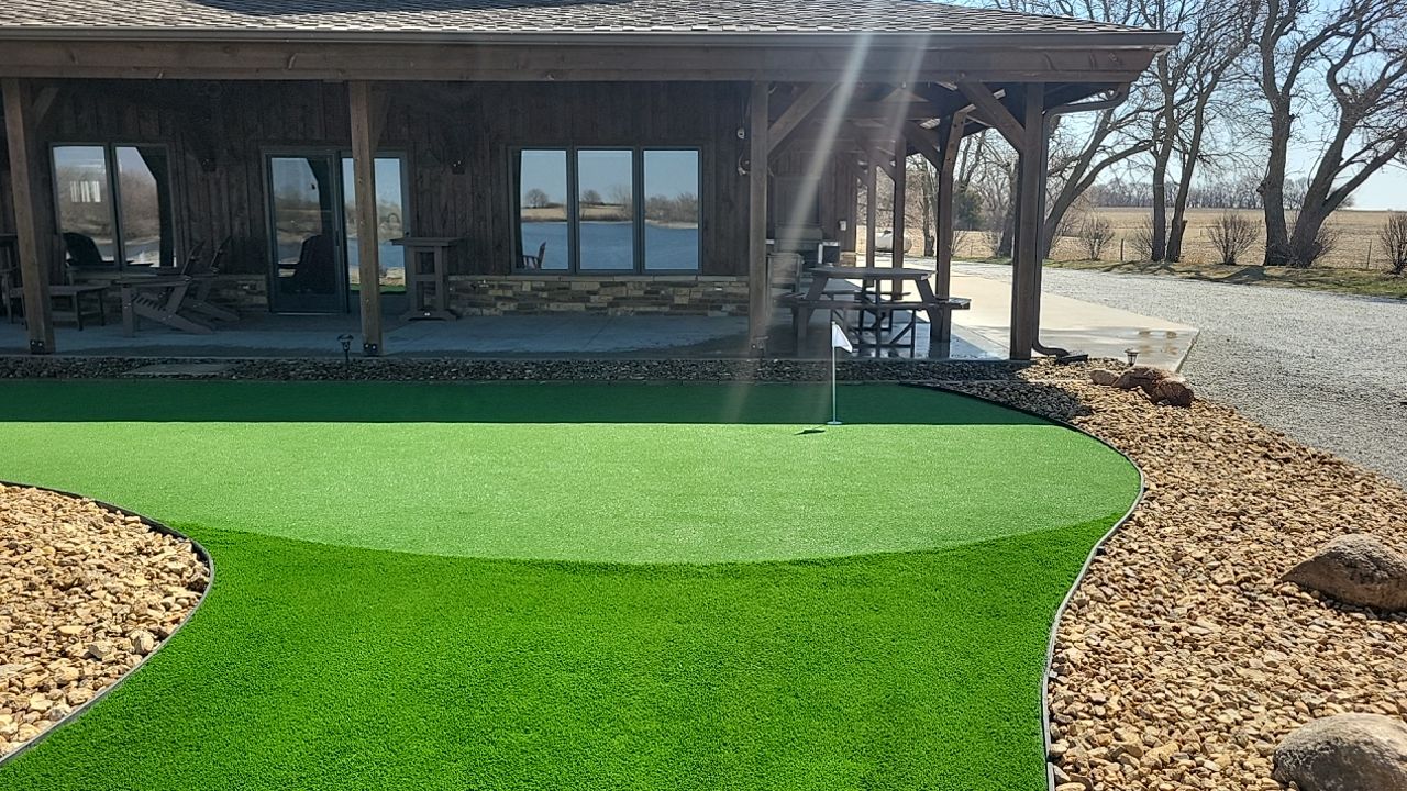 Putting Green / Driving Range / Entertaining space. by New Horizon Landscapes