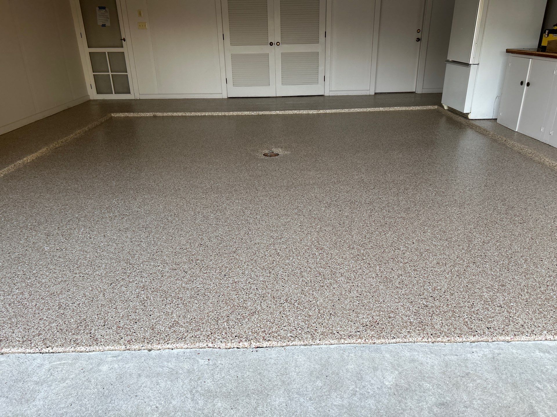 Pecan Floor Coating in South Bend! by Innovative Spaces / Innovative Concrete Coatings