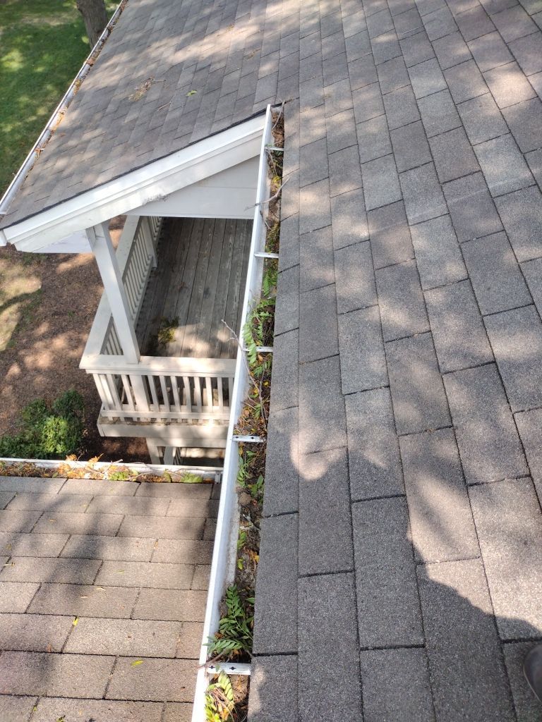 Commercial gutter cleaning Chicago, IL before photo with filled gutters