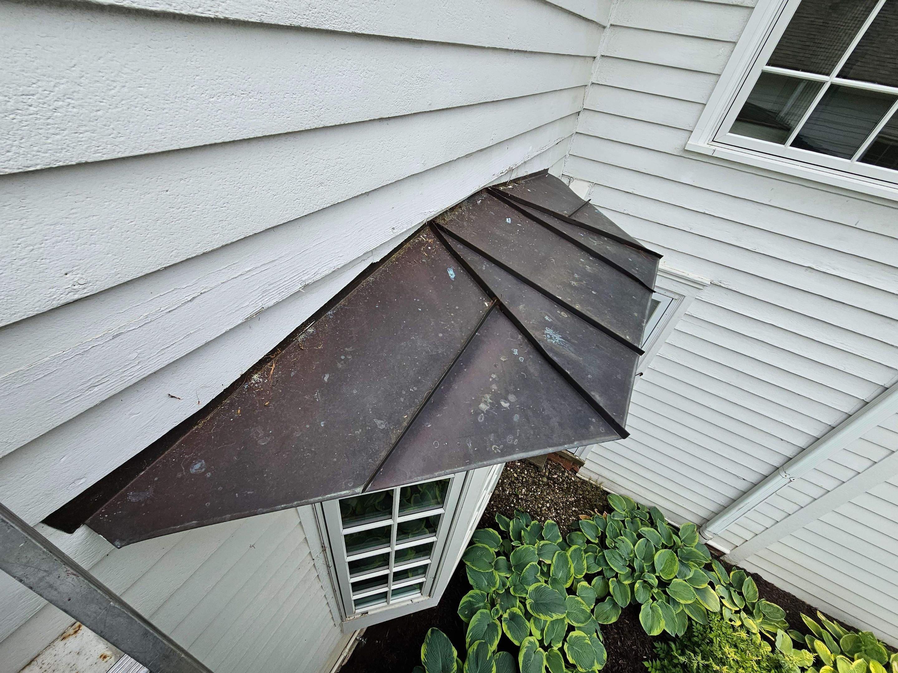 Copper Roof using Copper by Absolute Roofing and Construction