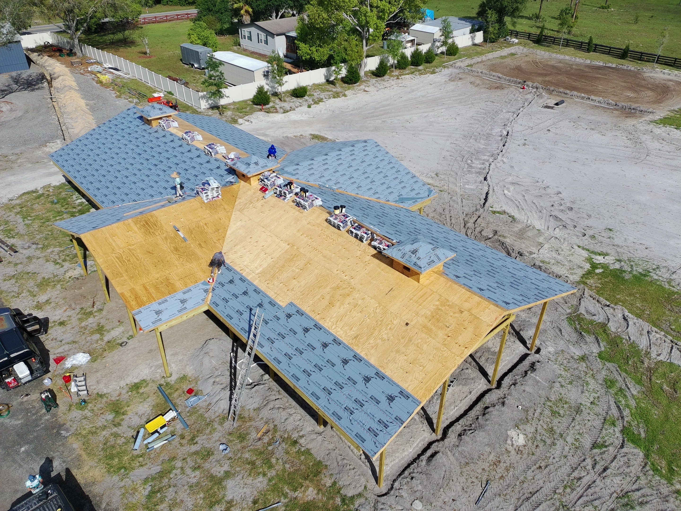 Custom Post-Frame Horse Barn and Shingle Roof Installation in Geneva by Fortified Roofing Solutions Corp.