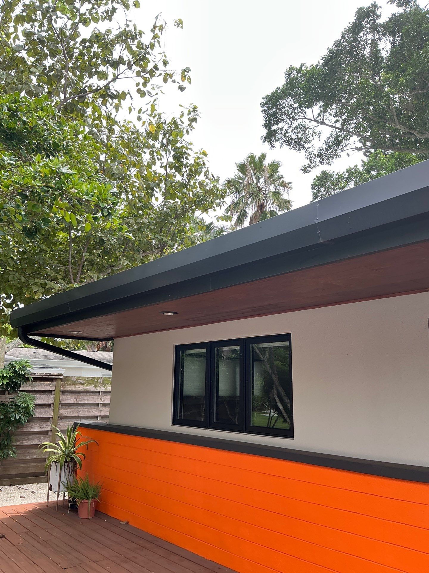 Black Seamless Gutters in Sarasota FL by Gutter Professors