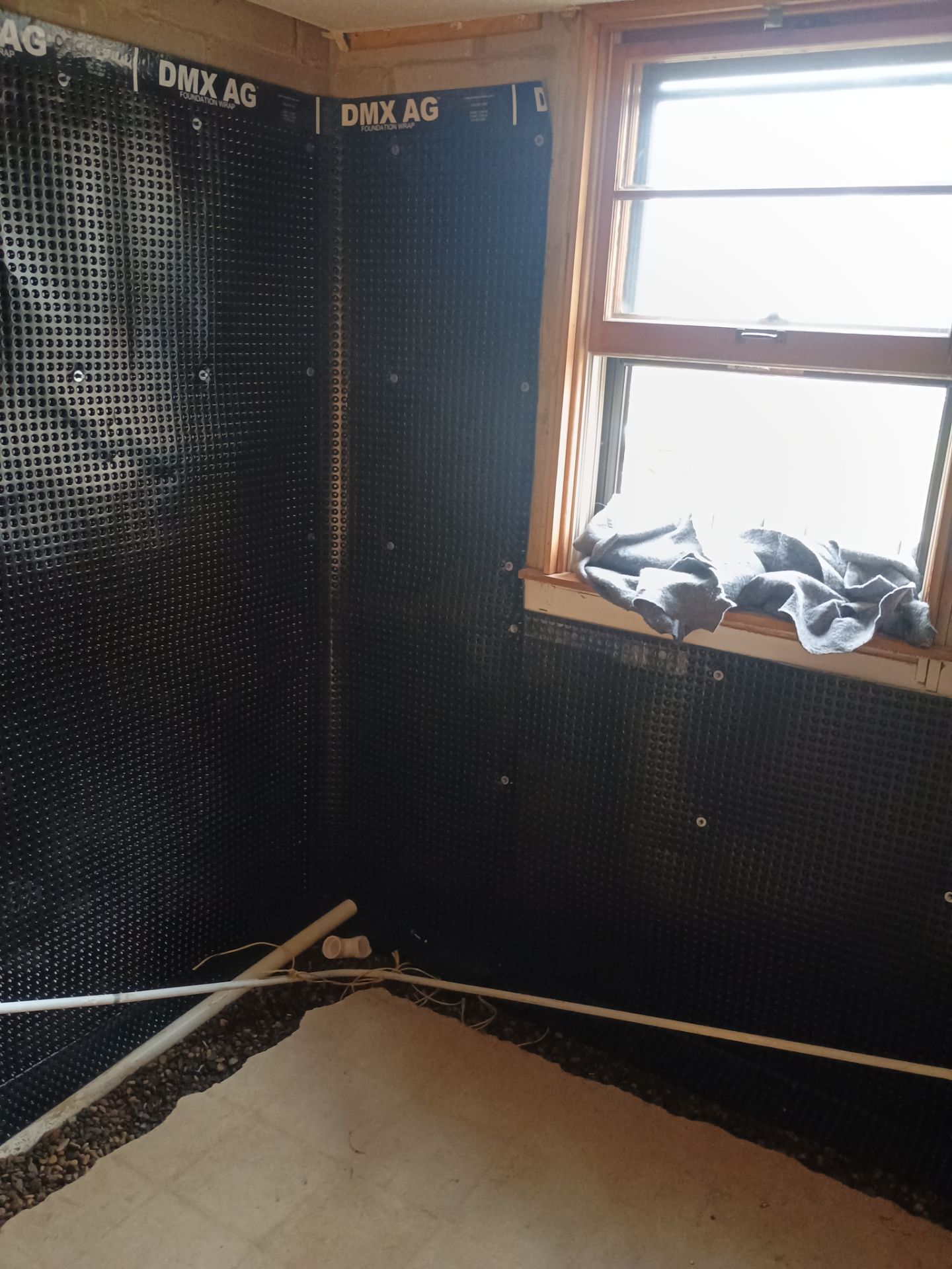Interior Drain Tile & Foundation Crack Repair in St. Anthony, MN by Waterproofing Northeast