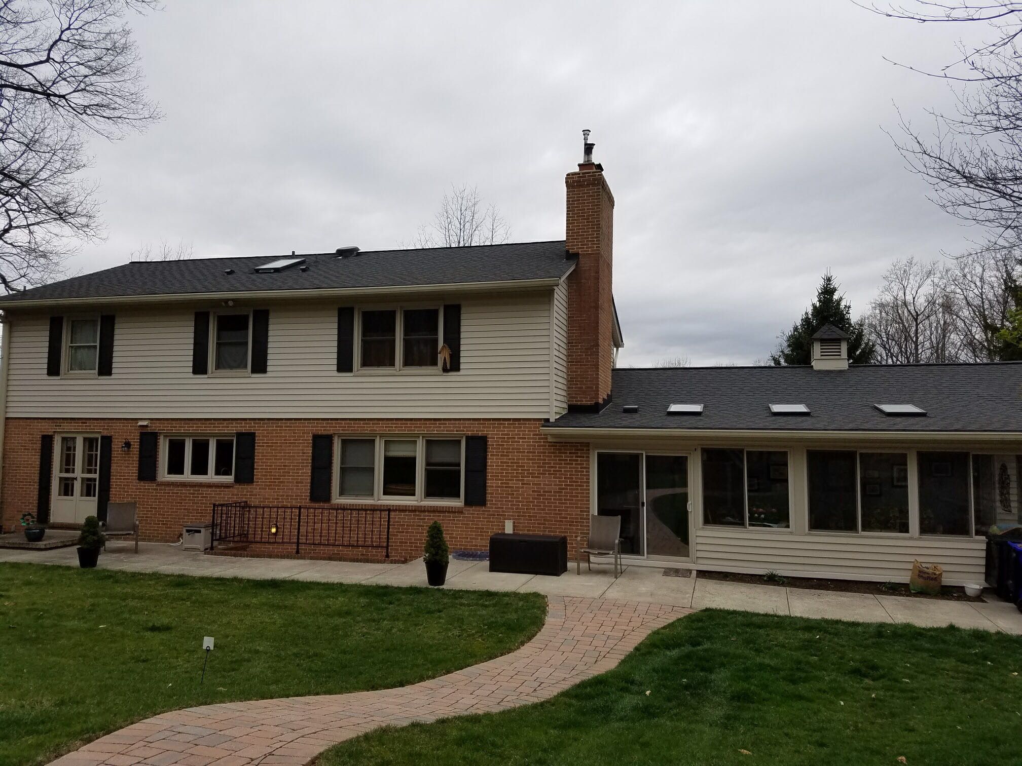 Siding and Roof Replacement by American Home Contractors