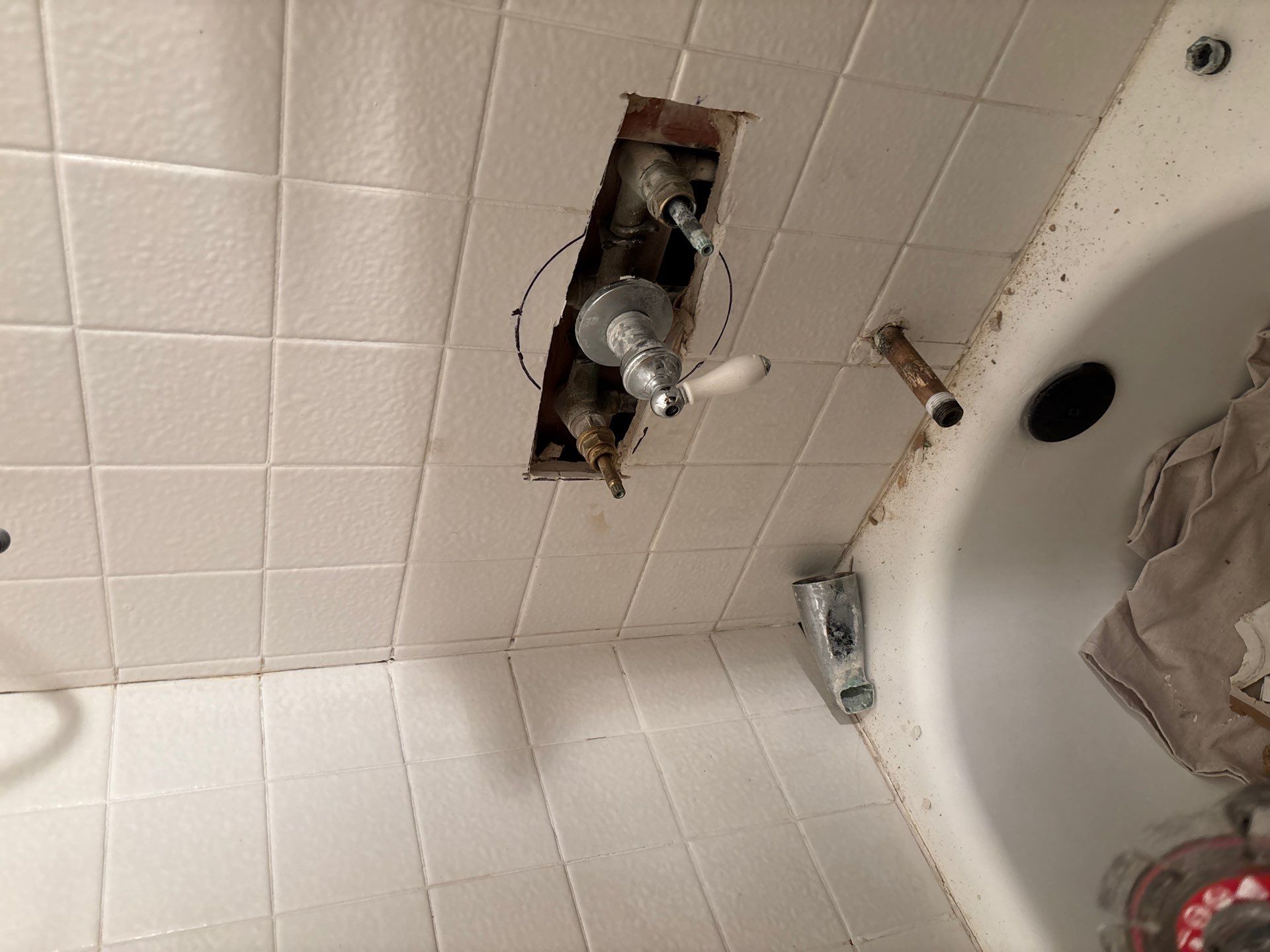 Installing Shower Fixtures  by Us Plumbing 