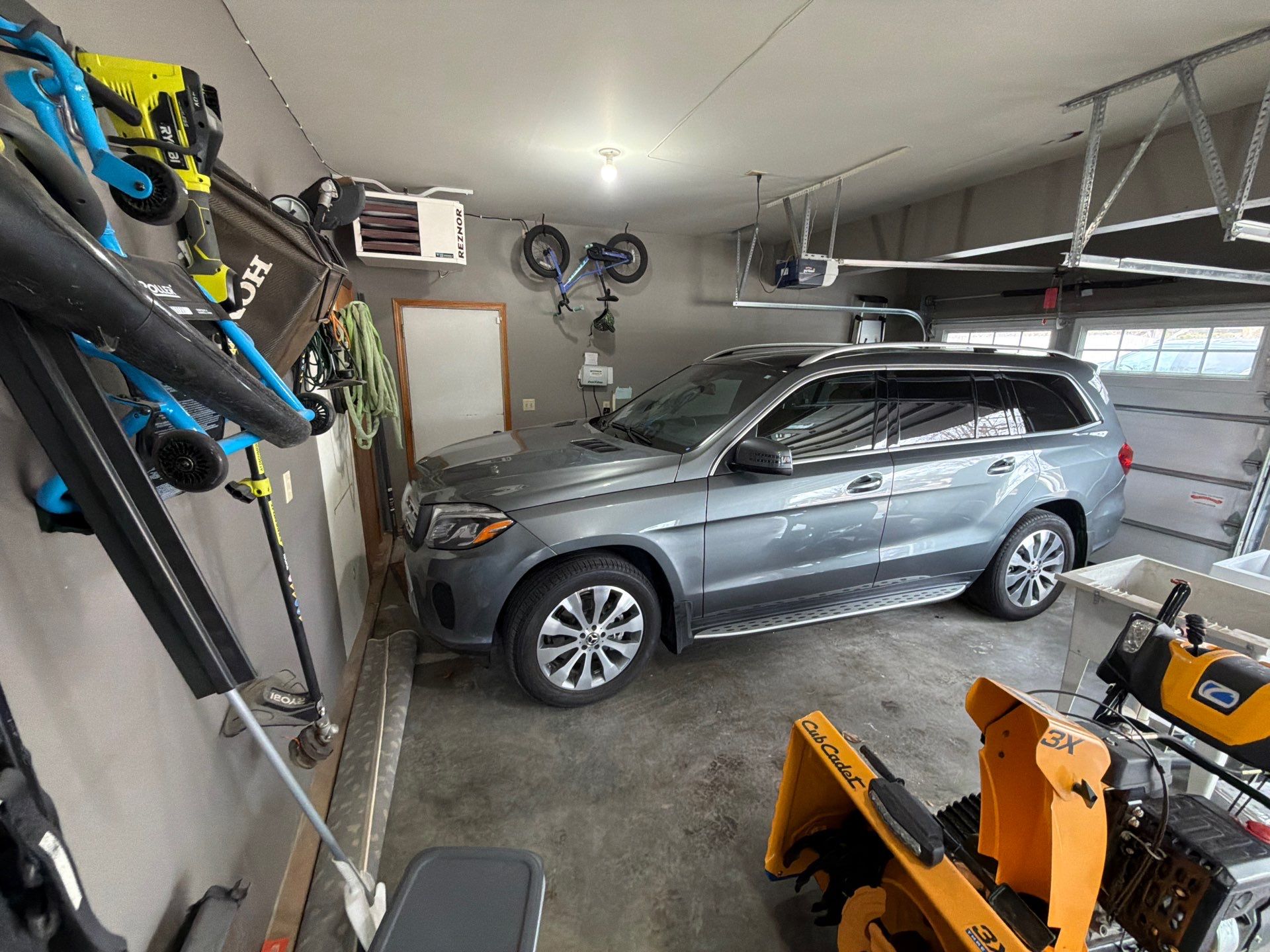 Garage Floor Concrete Coating and Crack Repair in Sioux Falls by Select Painting, Coatings & Garage Cabinets