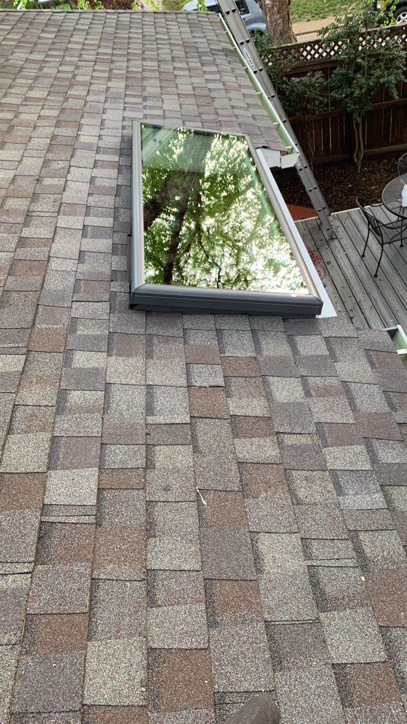 Skylight and Gutter Replacement by American Home Contractors