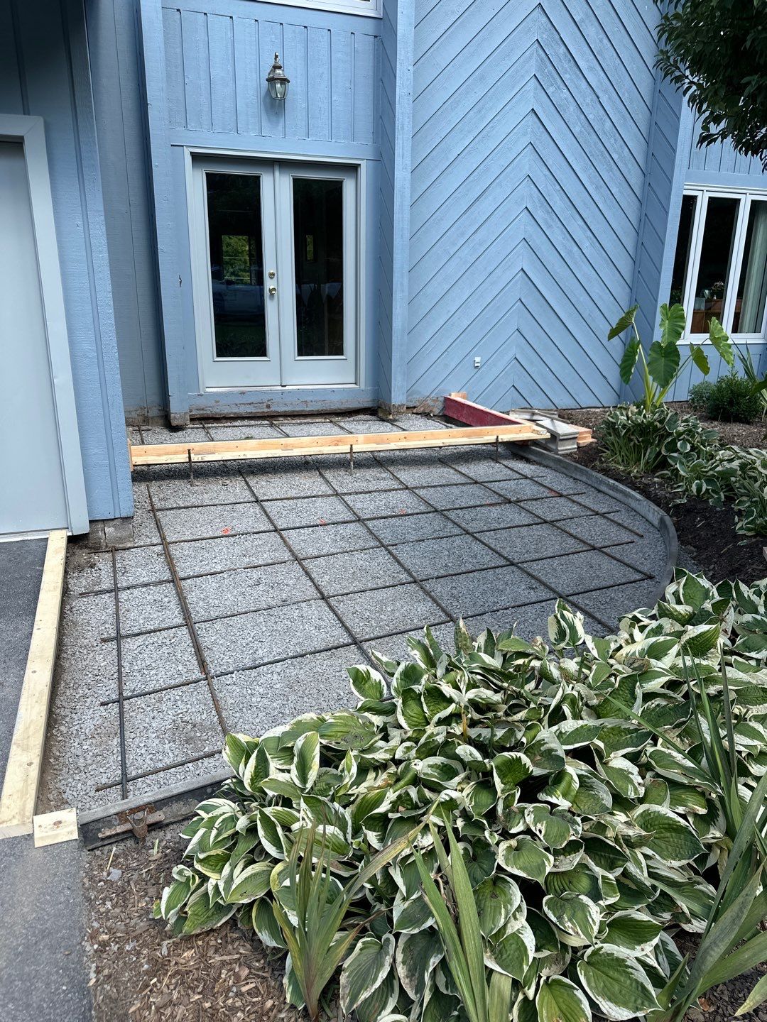 Charcoal Release Border with Broom Finish  by NG Masonry & Construction LLC