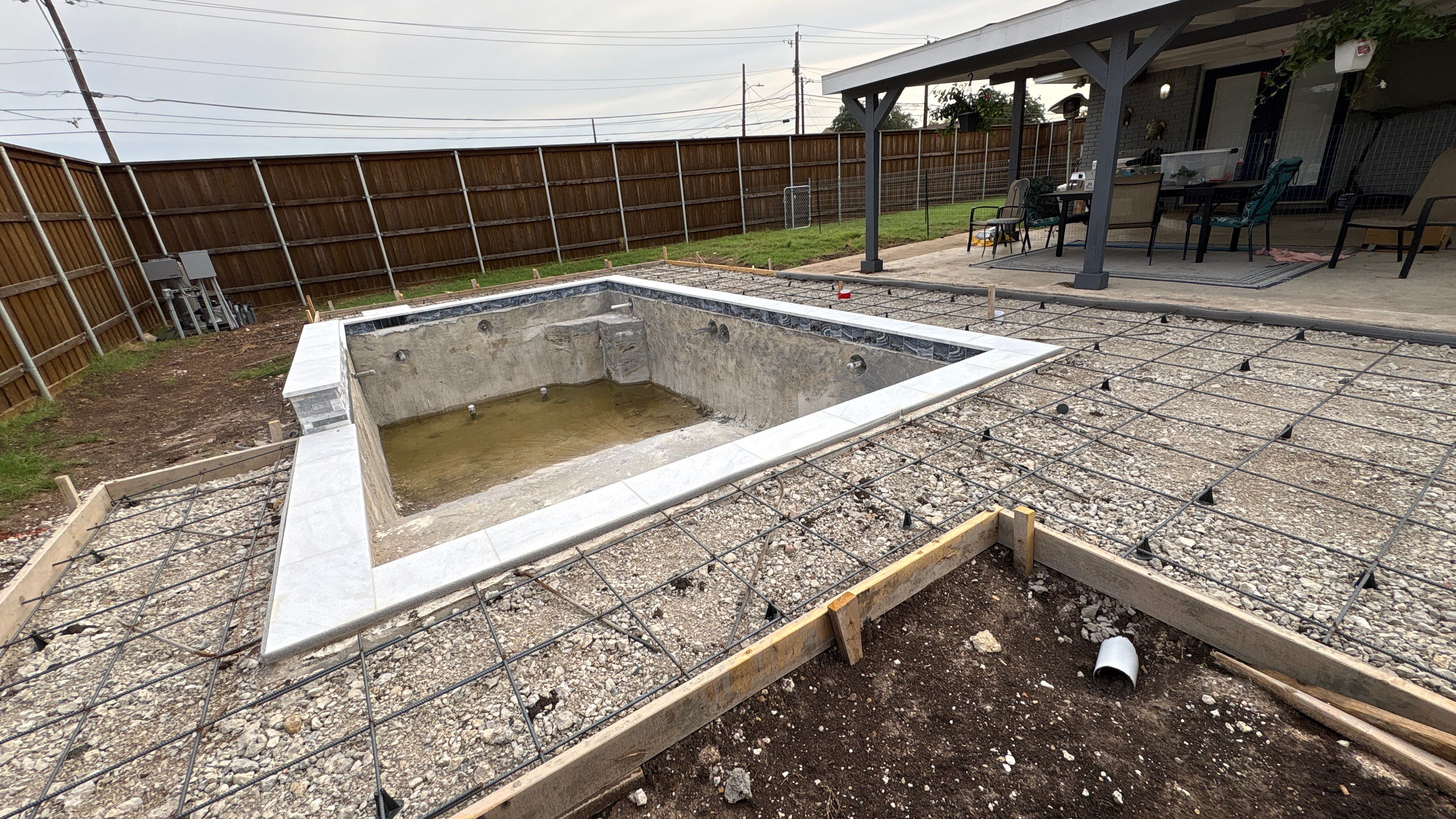 Compact Geometric Pool with Crisp White Interior by Pinnacle Pools and Spas - DFW