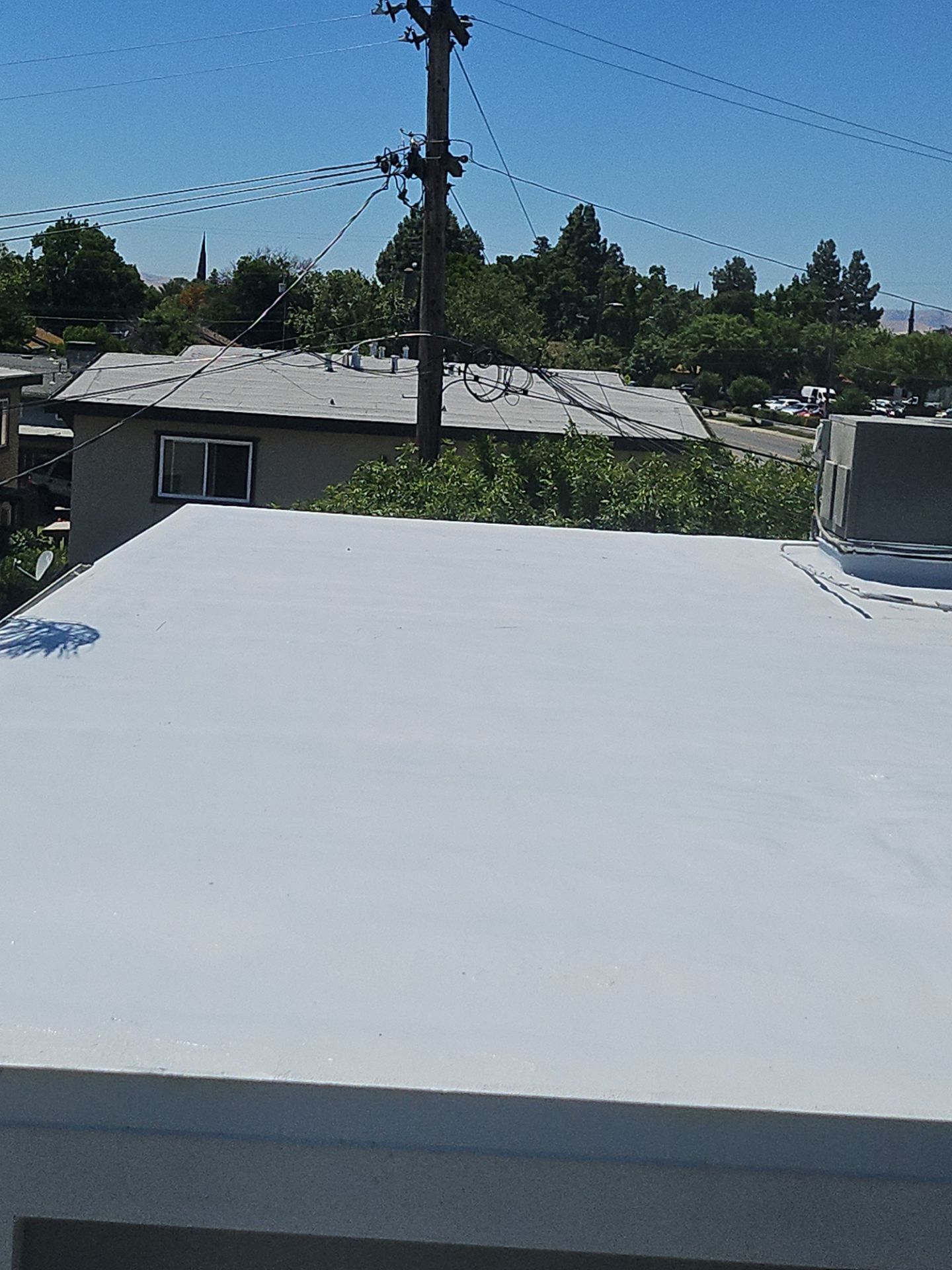 Foam Refurbish using General Coatings acrylic coatings and spray foam by Straight Edge Roofing Inc