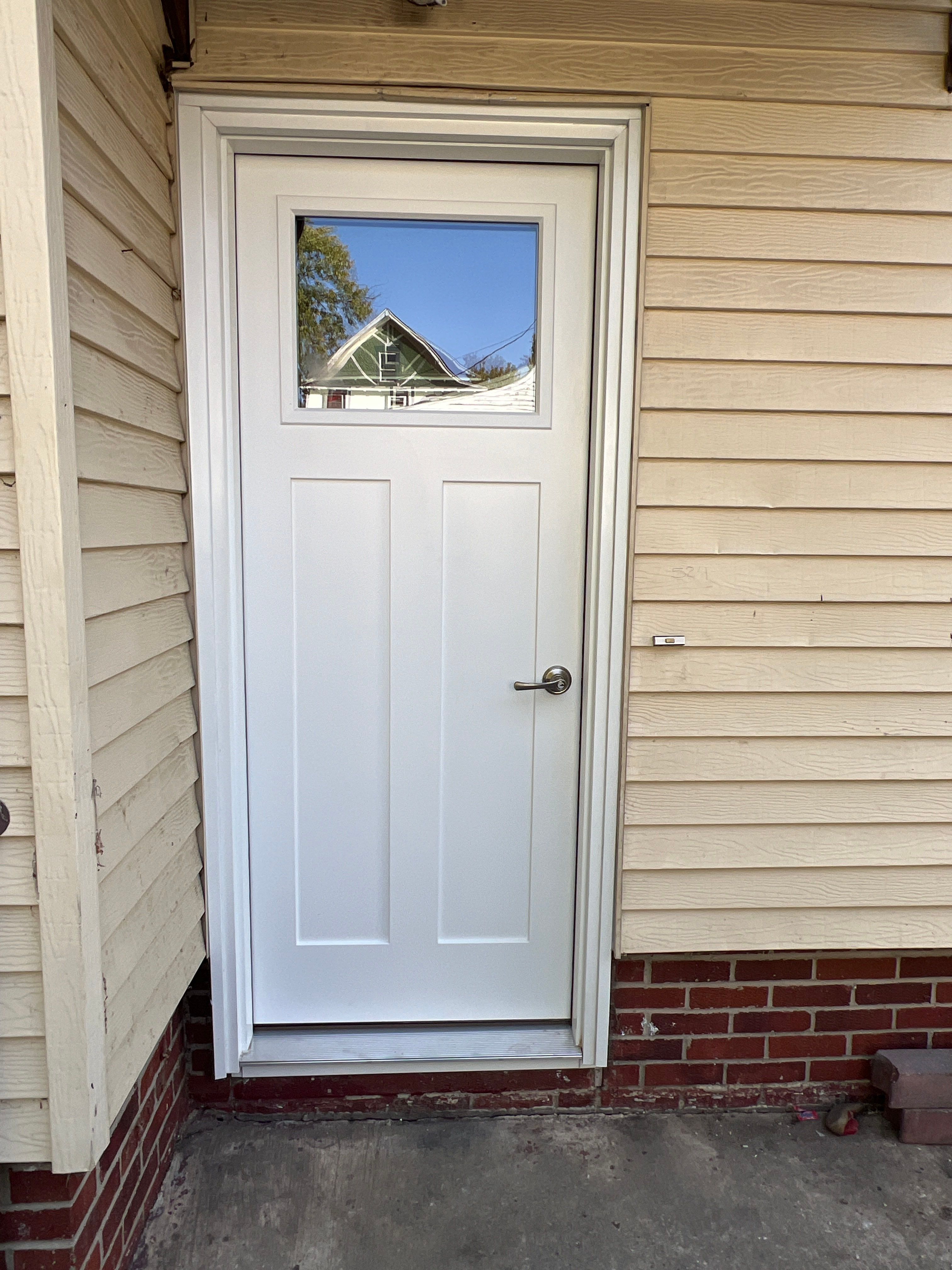 Pella Window installation using Pella 250 series vinyl window by United Windows and Siding LLC