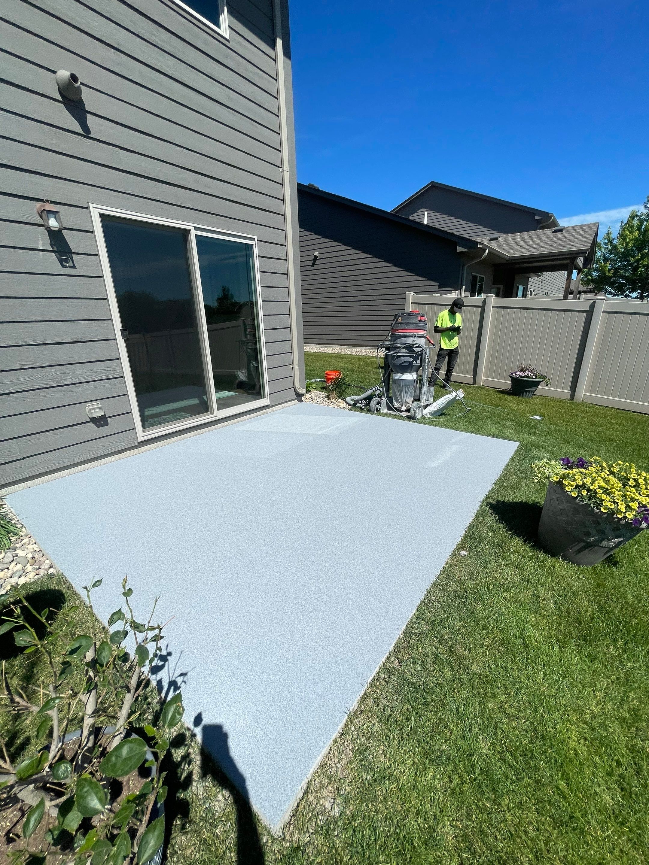 Custom Concrete Coating for Sioux Falls Patio and Front Walkway by Select Painting, Coatings & Garage Cabinets