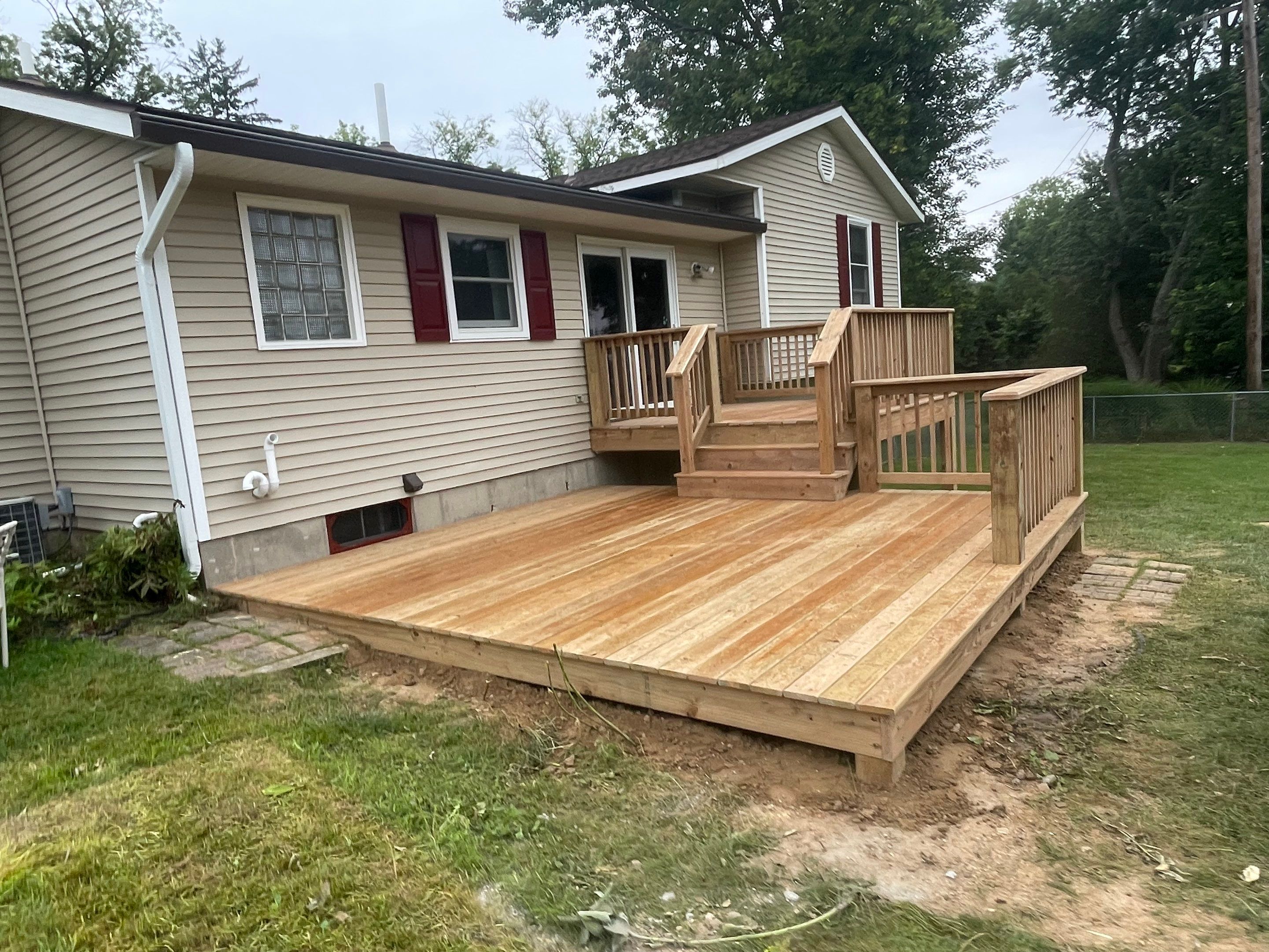 Deck Installation using Treated Lumber by Avalon Roofing and Exteriors