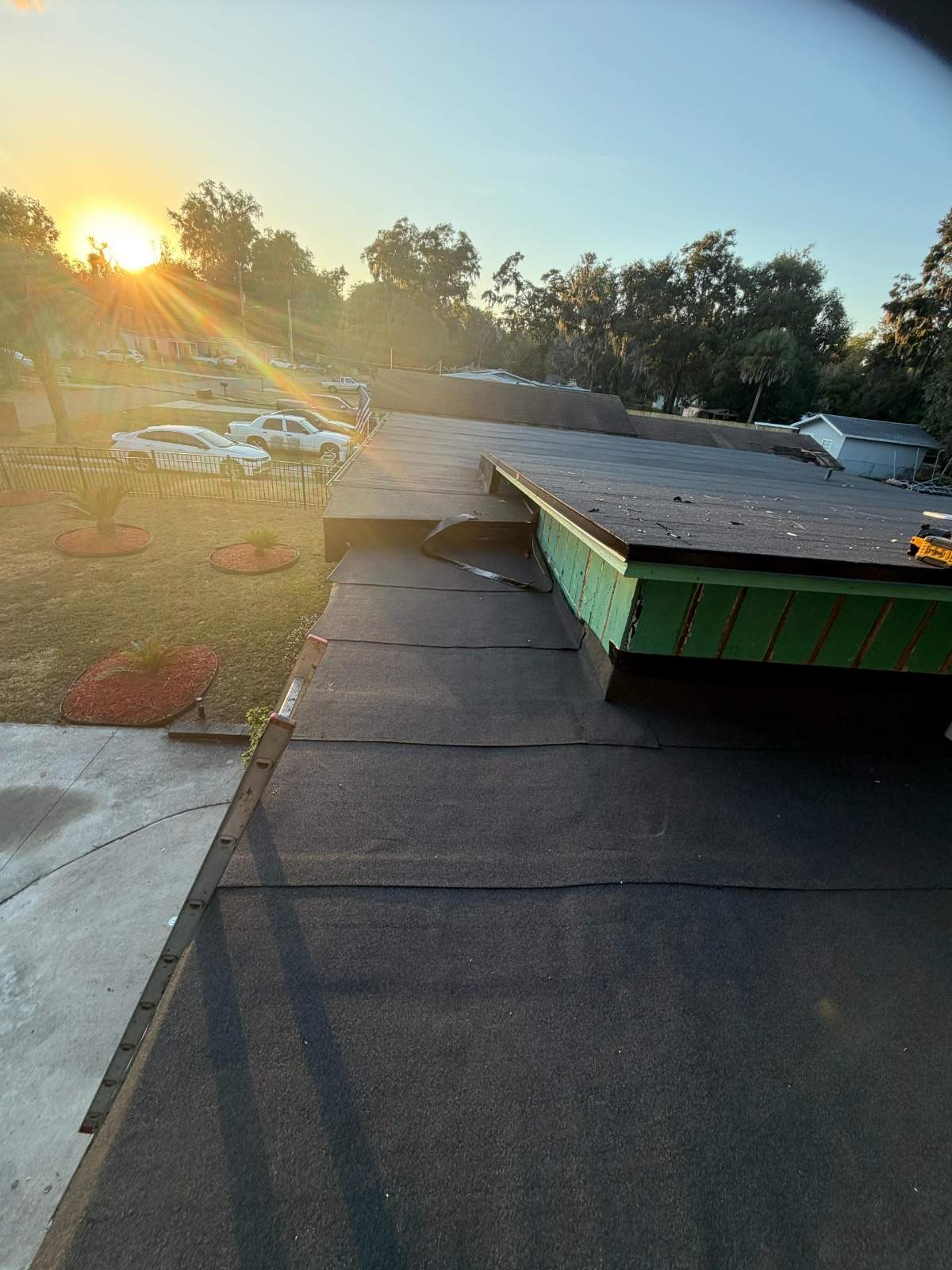 Flat Roof Renovation Due to Water Accumulation by urban green energy llc