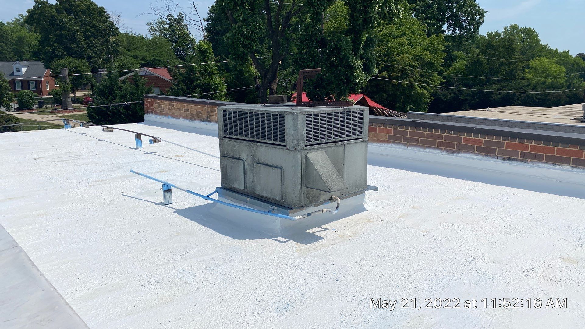 Commercial Roof Coating using Fiberseal basecoat and Silicon Topcoat by Just In Time Roofing and Restoration