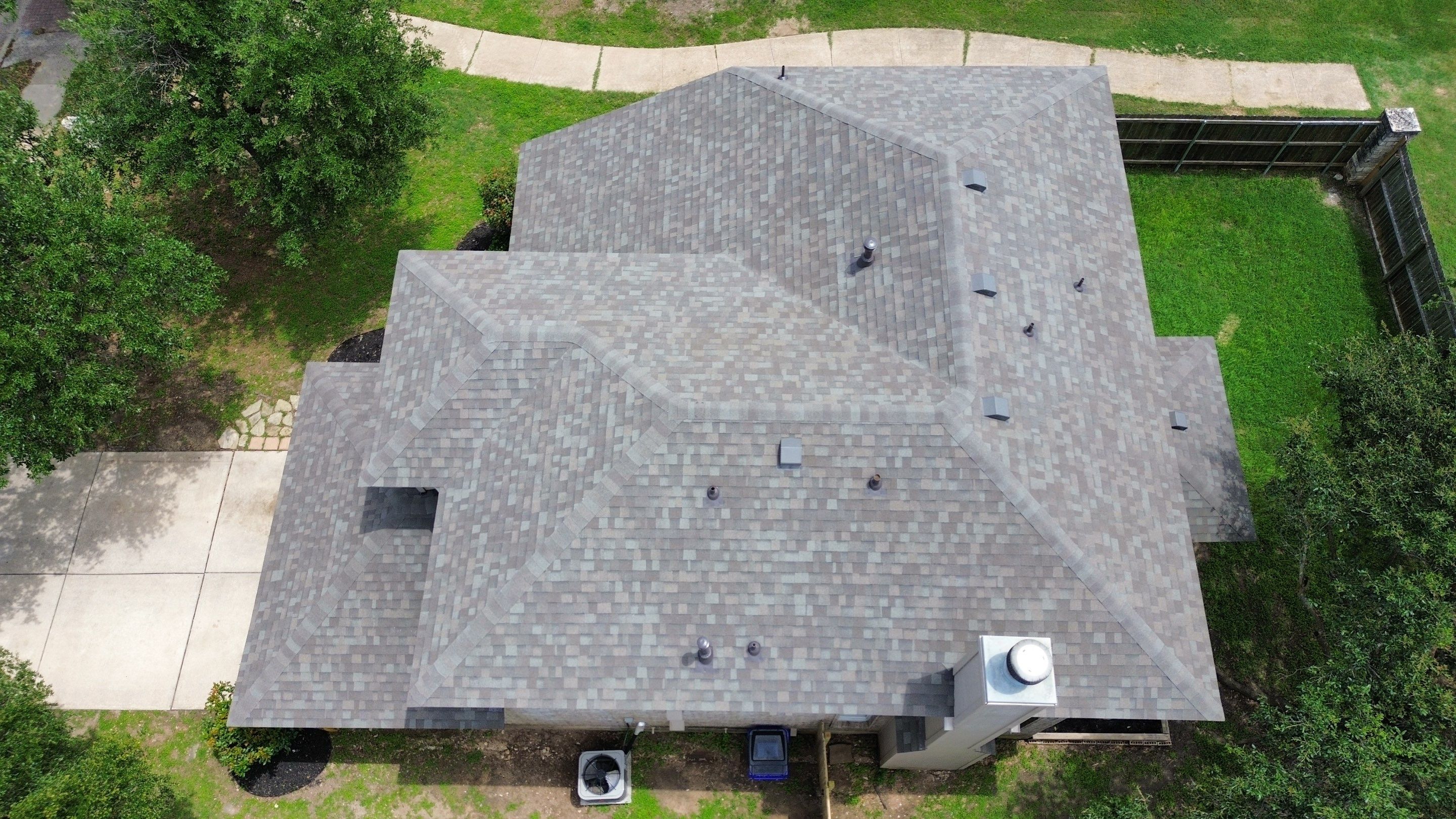Roof Replacement & Chimney Cricket Upgrade in Cedar Park, TX by Kstylez Roofing & Construction