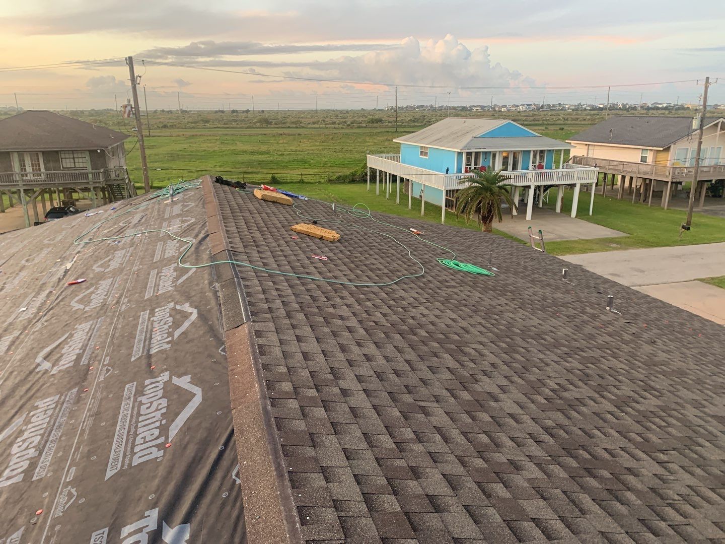 Galveston Waterfront Roof Installation In Progress by Elite Roofing LLC