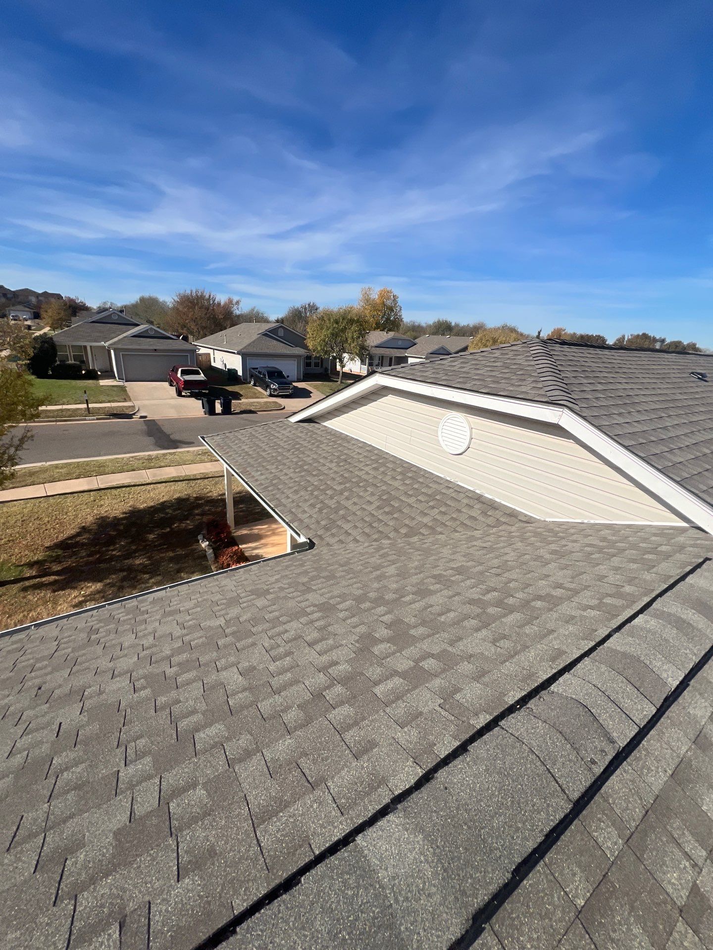 roof replacement & gutter installation in Edmond by McCann's Roofing and Construction