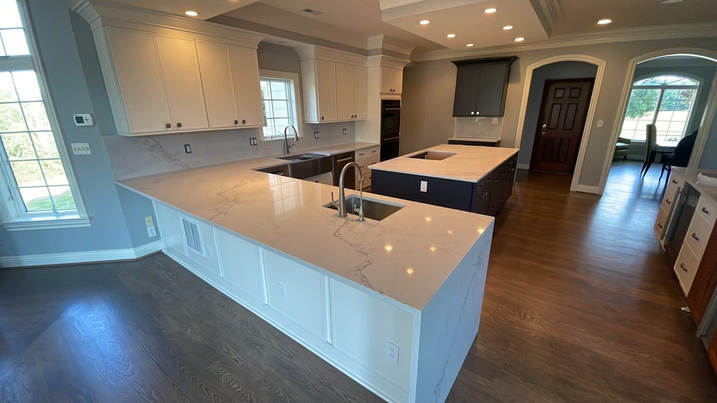 Kitchen Remodel using Fabuwood Luna Dove and Indigo Cabinetry by HomeWerkes Design & Build