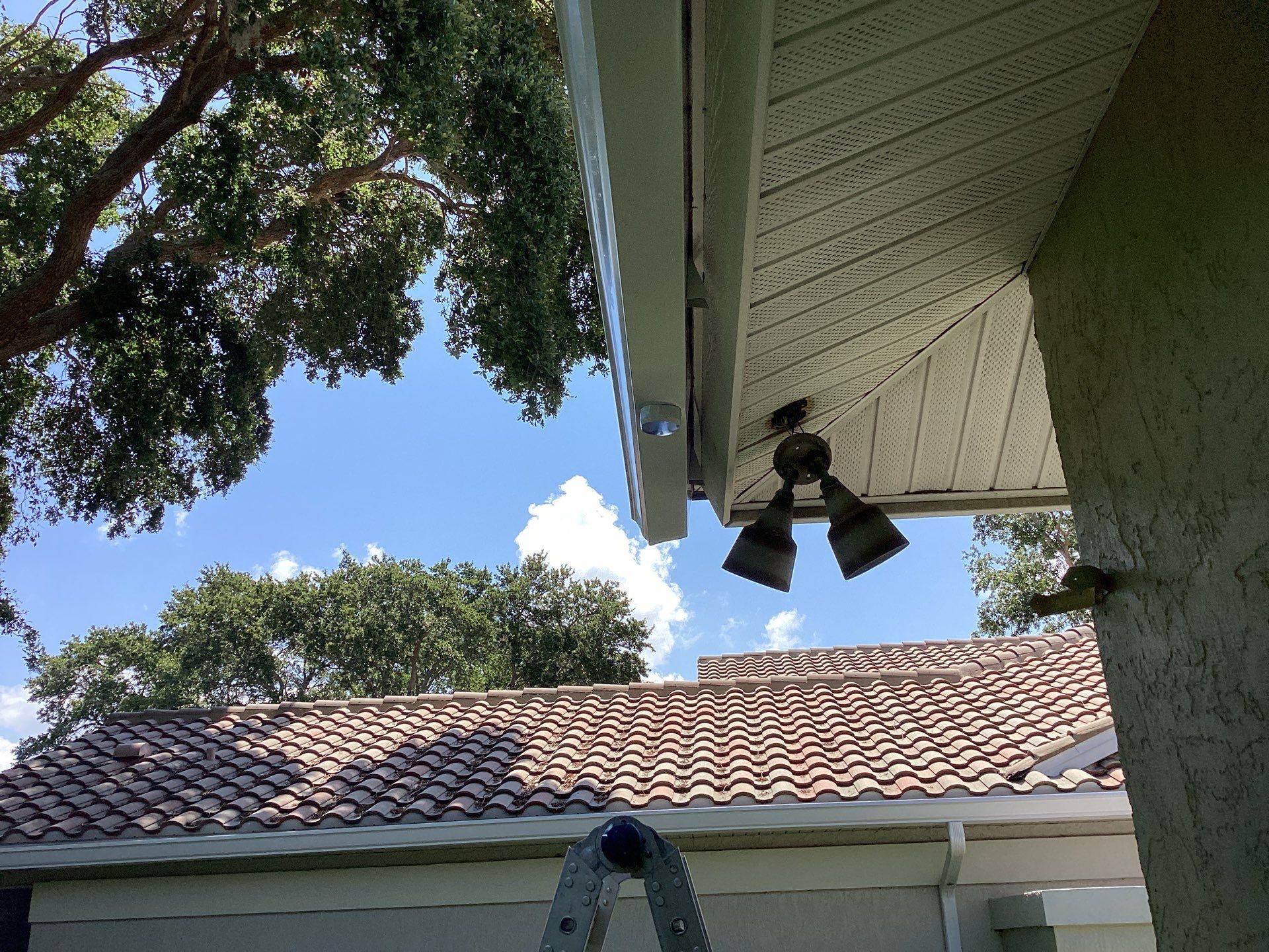 White Gutter Installation in Sarasota FL by Gutter Professors
