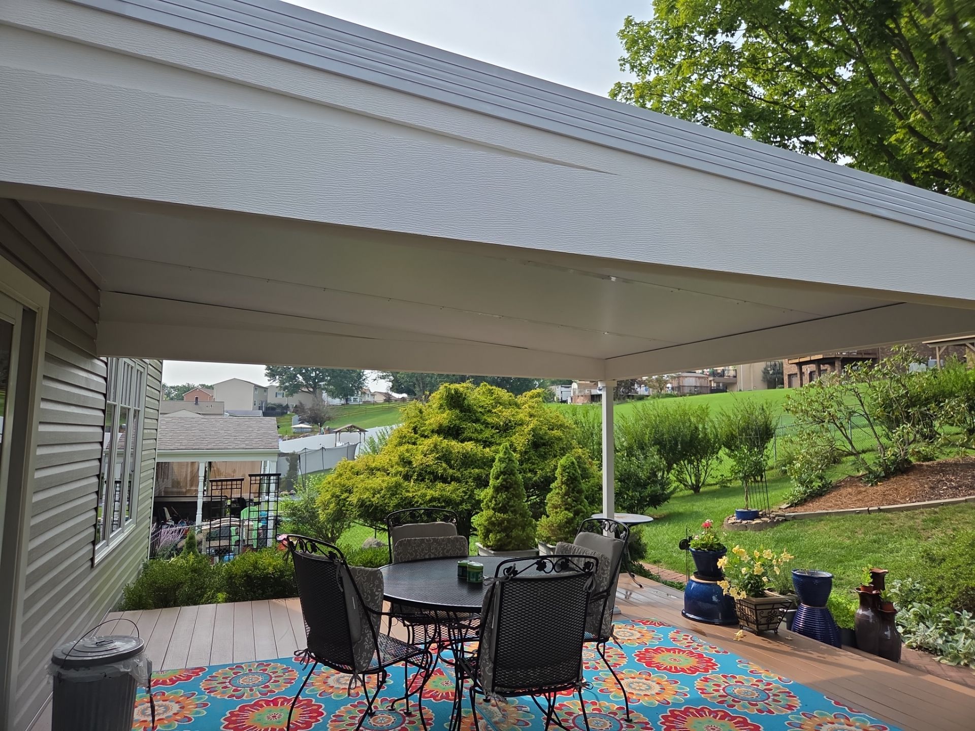 Composite Deck Build with Integrated Patio Cover in Washington by Cousins Roofing Siding & Decks