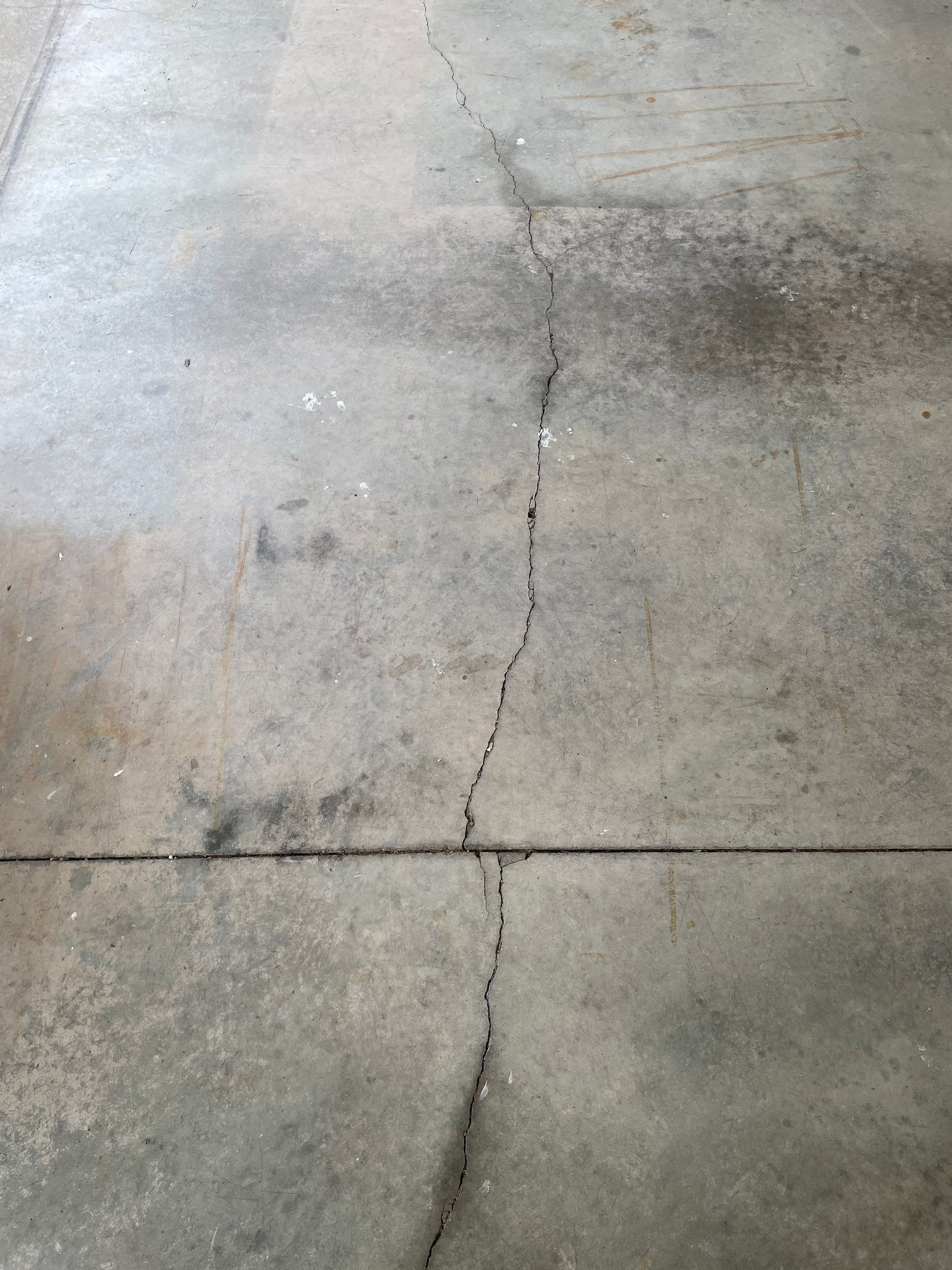 Multi-Car Garage Floor Coating and Crack Repair in Tea by Select Painting, Coatings & Garage Cabinets