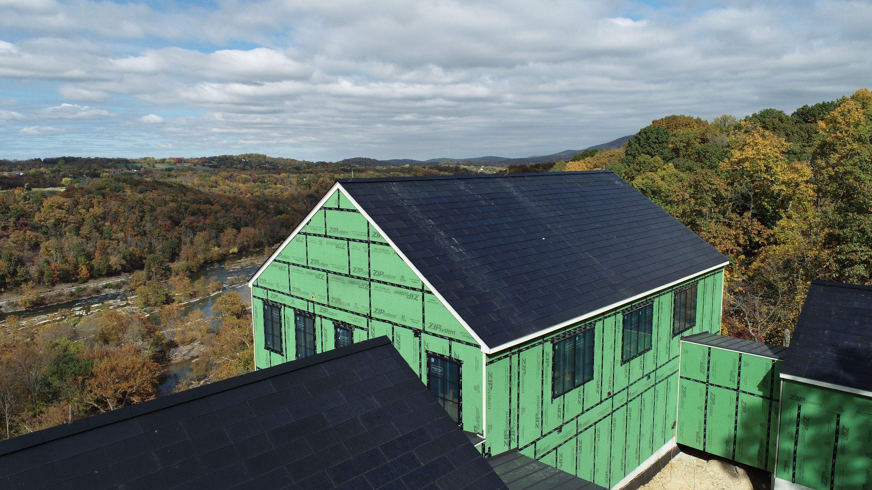 Roof Installation using Tesla Solar Roof V3 by American Home Contractors