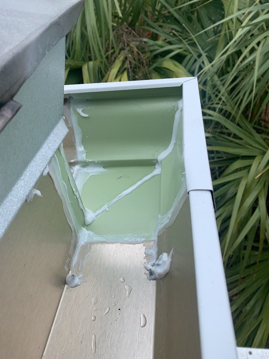 Seamless Gutter Installation Using White K-Style Gutters by Gutter Professors