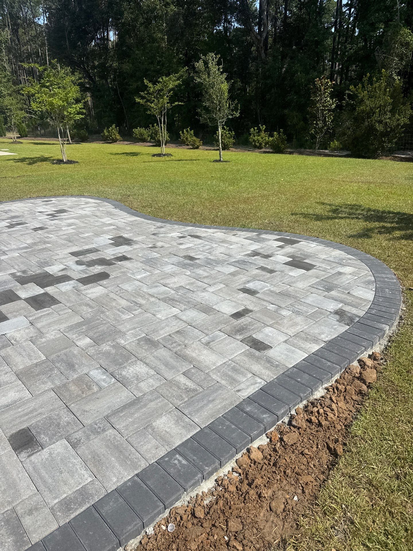 Custom Paver Patio and Landscape Installation in Okatie by Lowcountry Scapes, LLC