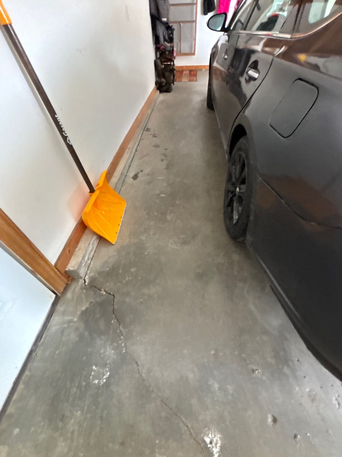 Gray and Black Speckled Polyurea Garage Floor in Dell Rapids by Select Painting, Coatings & Garage Cabinets
