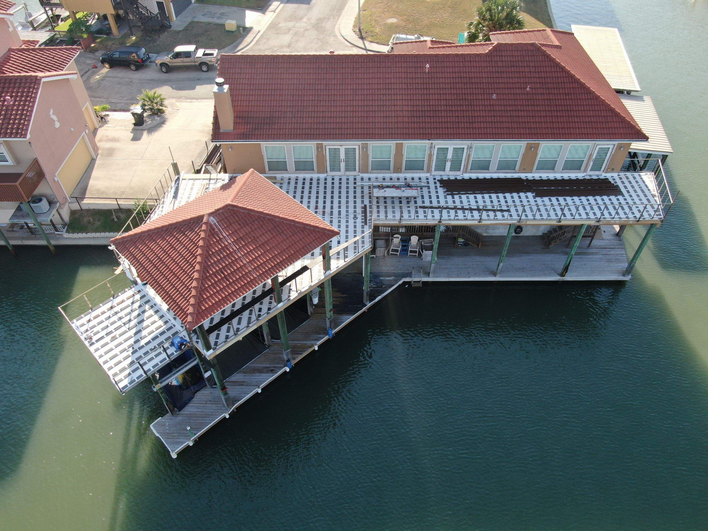 Walk Out Patio Cover by Bayfront Roofing and Construction