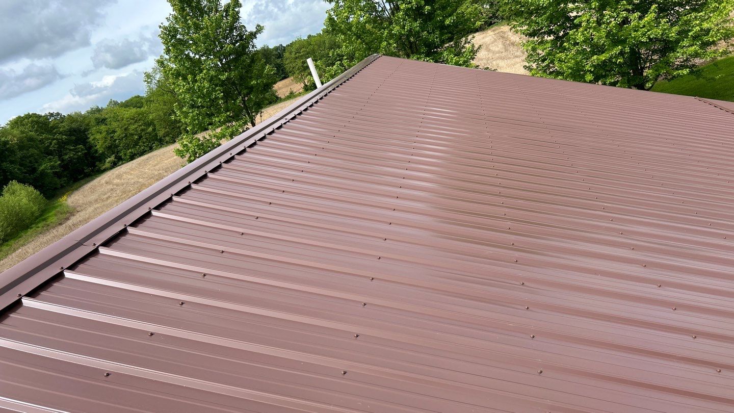 Residential Roofing Installation using Performance Panel Metal - Coca Brown by RoofX 