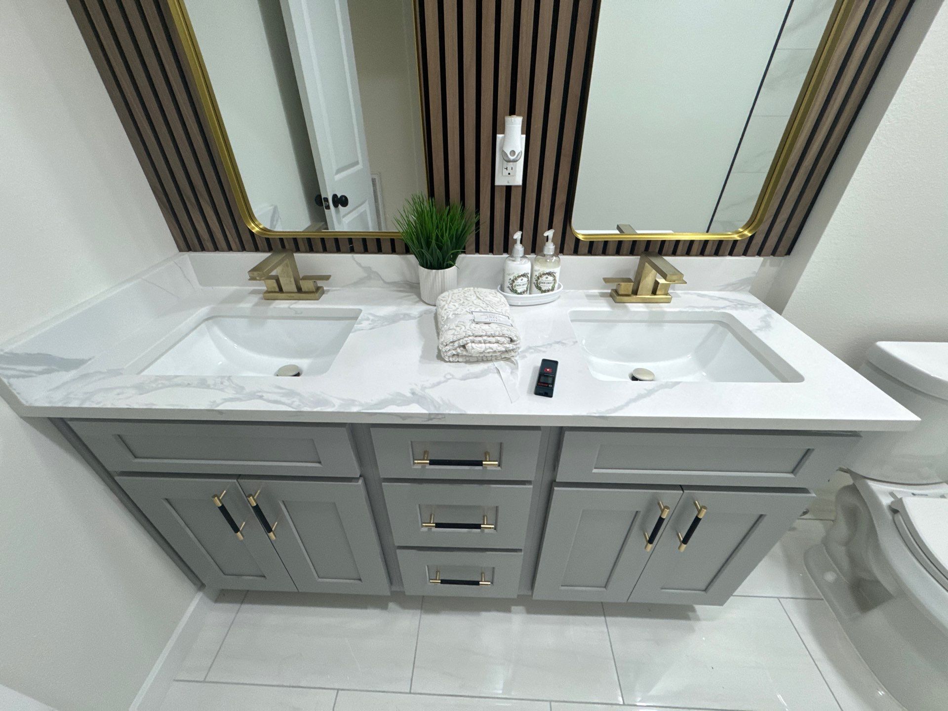 Houston Bathroom Renovation Featuring Custom Wood Slats by Rolling Nations