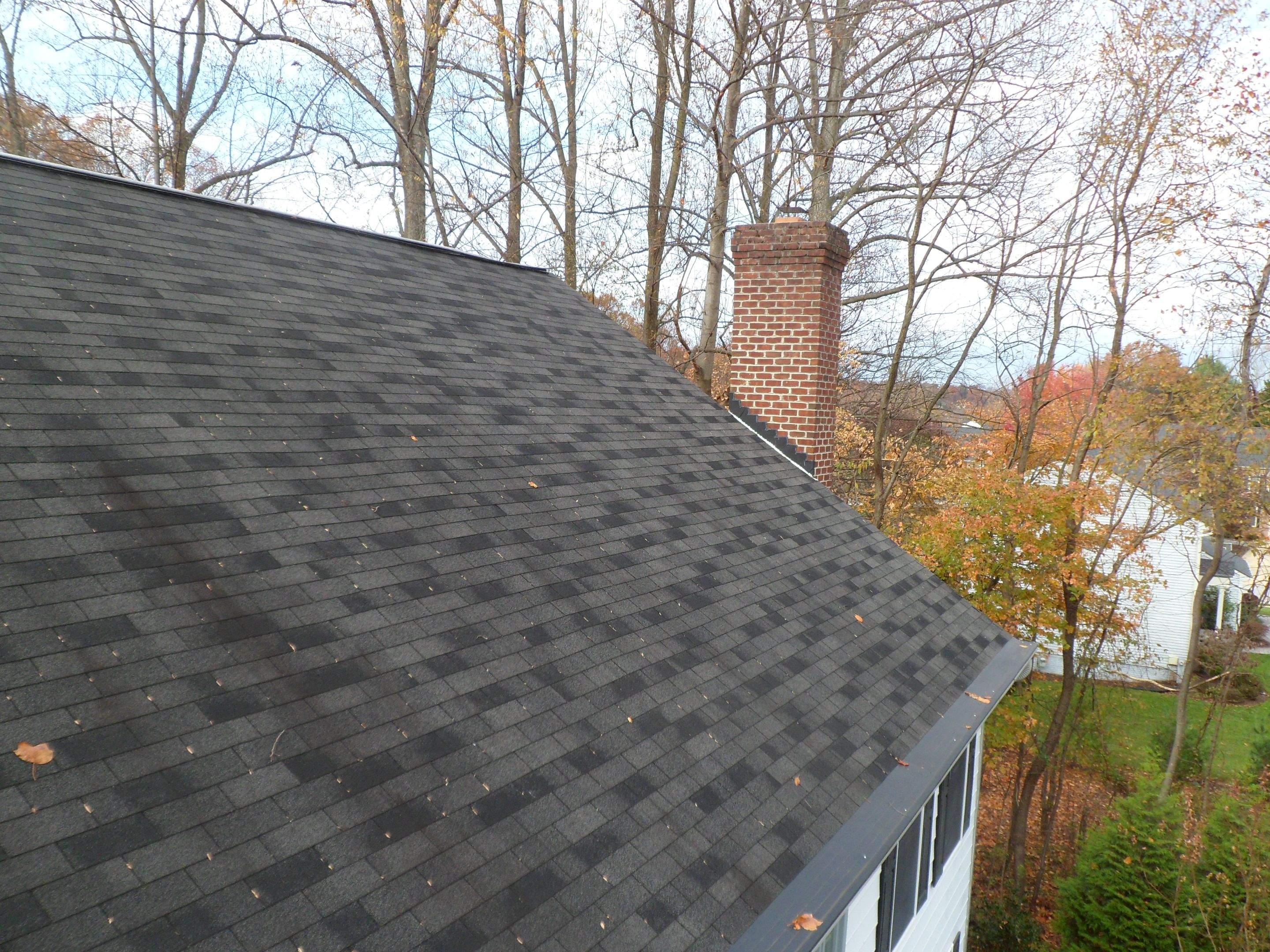 Residential Roofing Installation using Charcoal Black by Alpha Design Services
