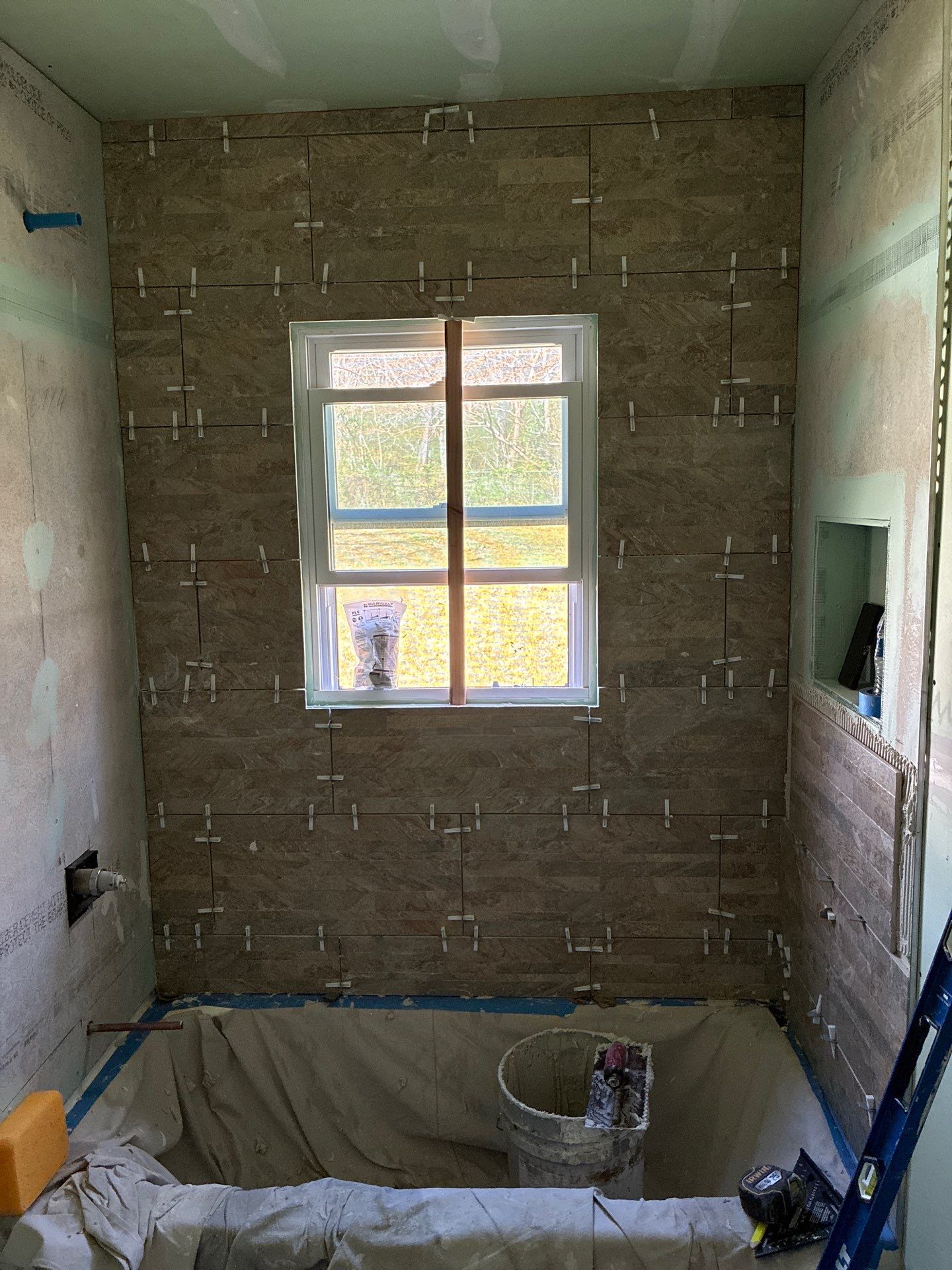 Beautiful Bathroom Remodel by In & Out Construction & Remodeling, LLC