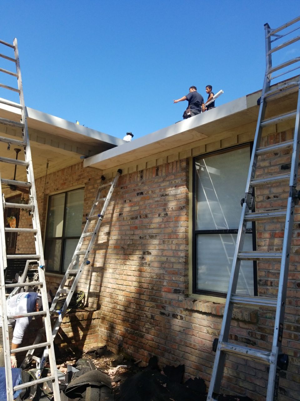 Residential Roofing Installation using Roof Replacement by American Roofing & Construction LLC