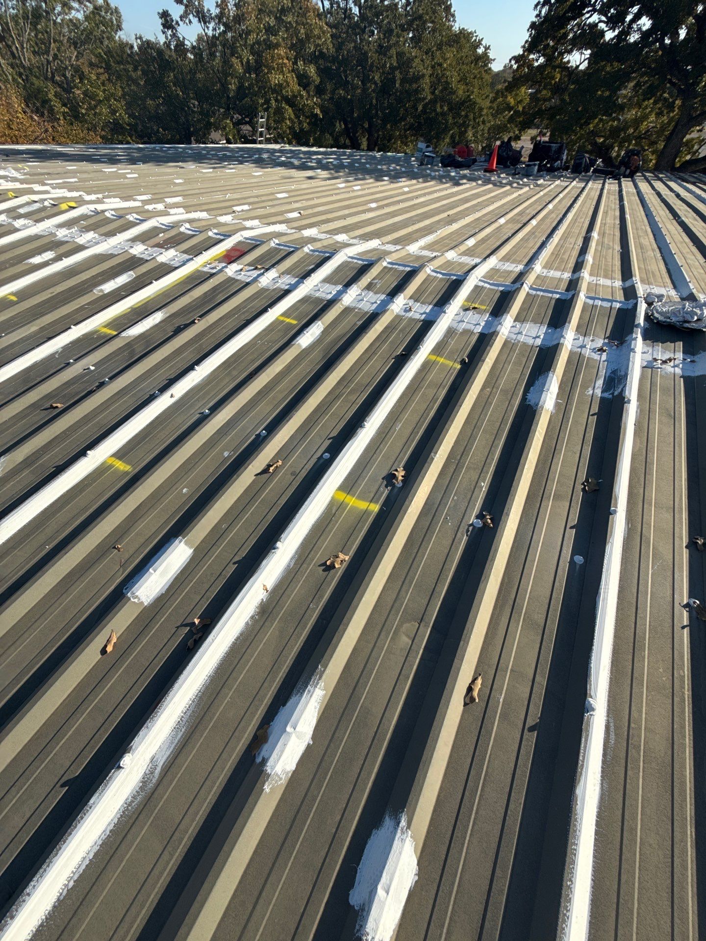 Silicone Coating Metal Rehab by First Out Roofing 