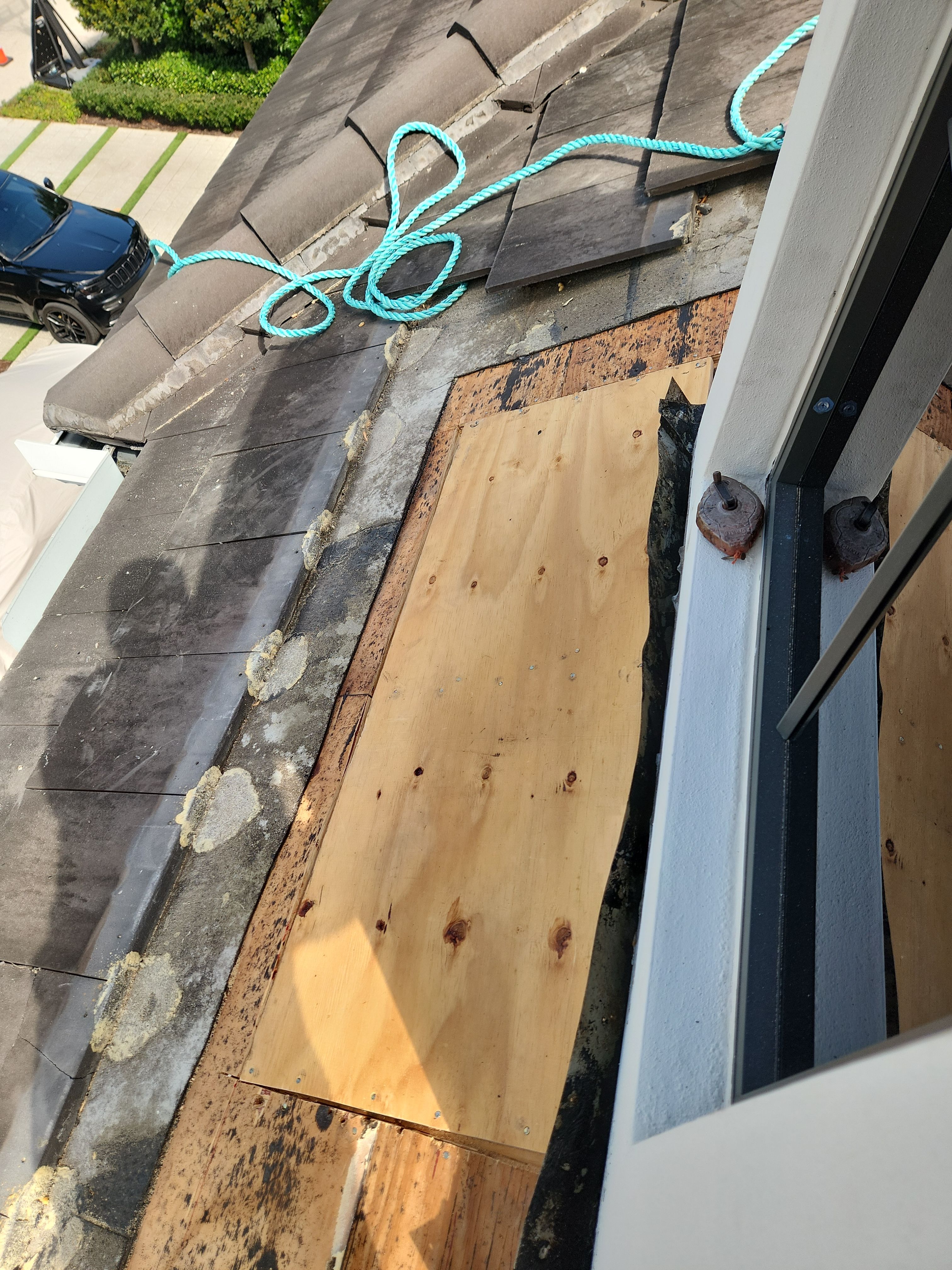 Silicone roof coating and tile tune up in Boca Raton by Aastro Roofing