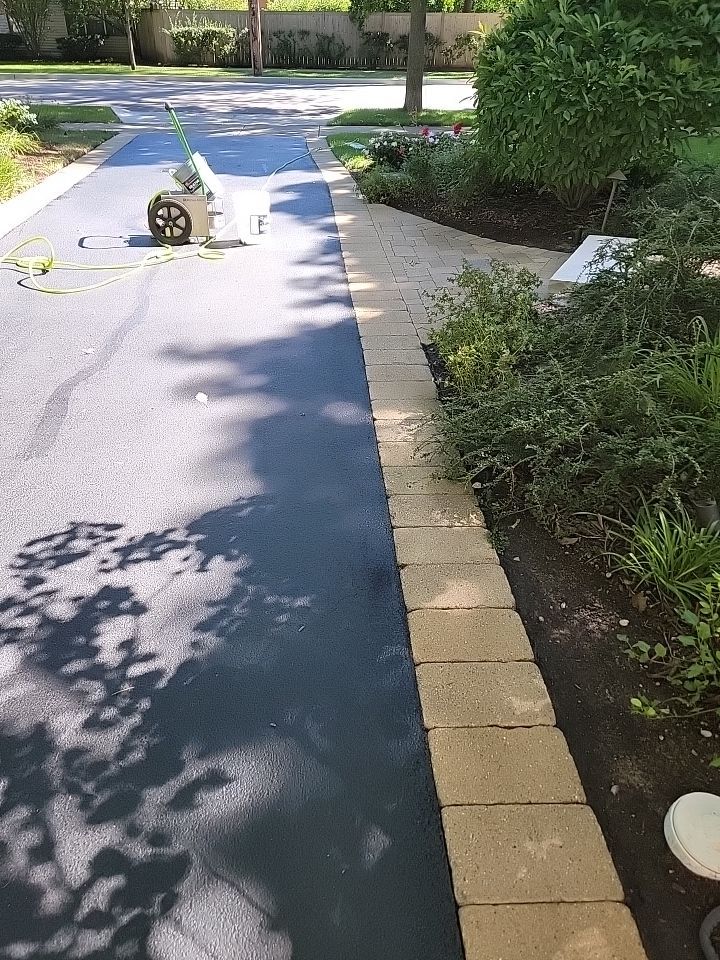 Brick paver clean, sand and seal.  using surebond SB-8700 by Northern Power Washing LLC.