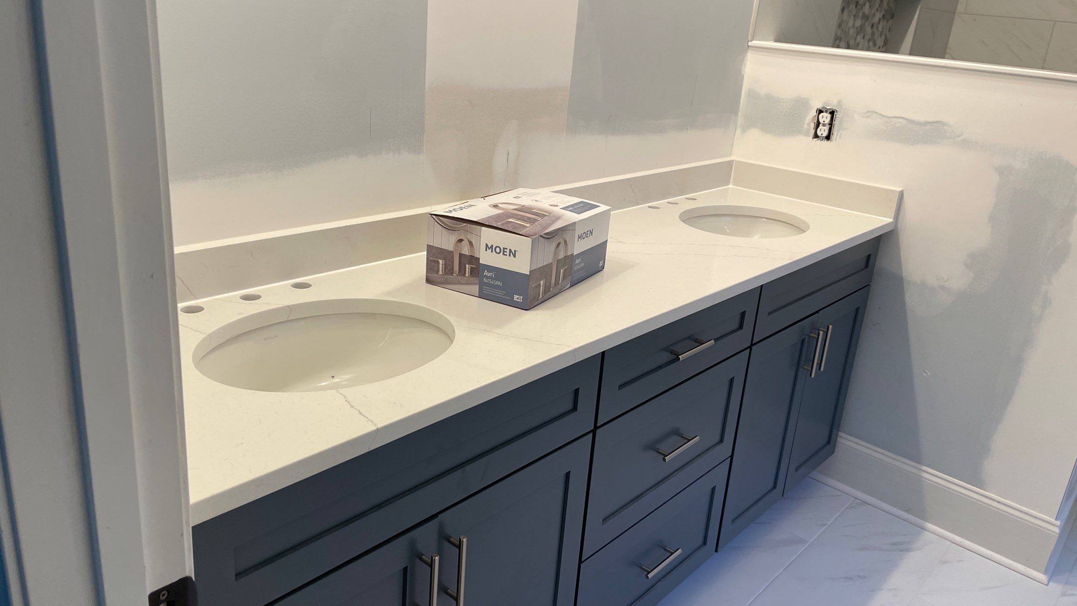 Bright Bathroom Remodel with Wall Removal, Stand Alone Tub and New Vanity by Footprints Floors of Coastal Carolina