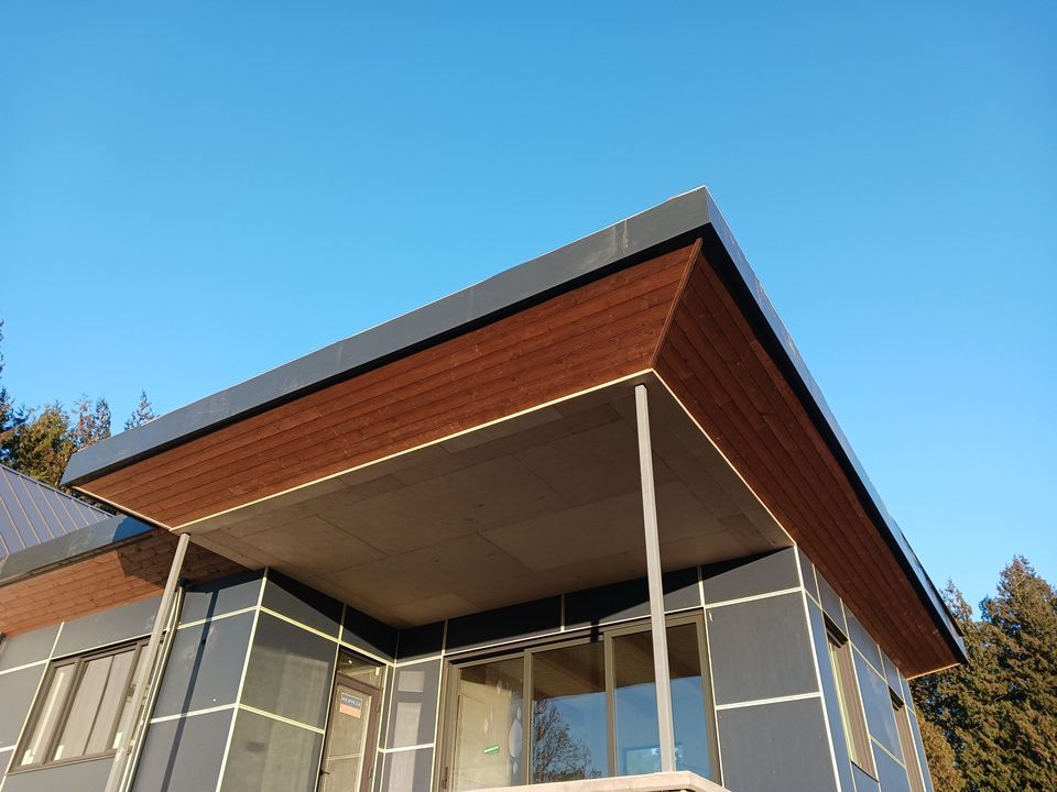 Residential Roofing Installation using multiple products by Top Notch Roofing Inc