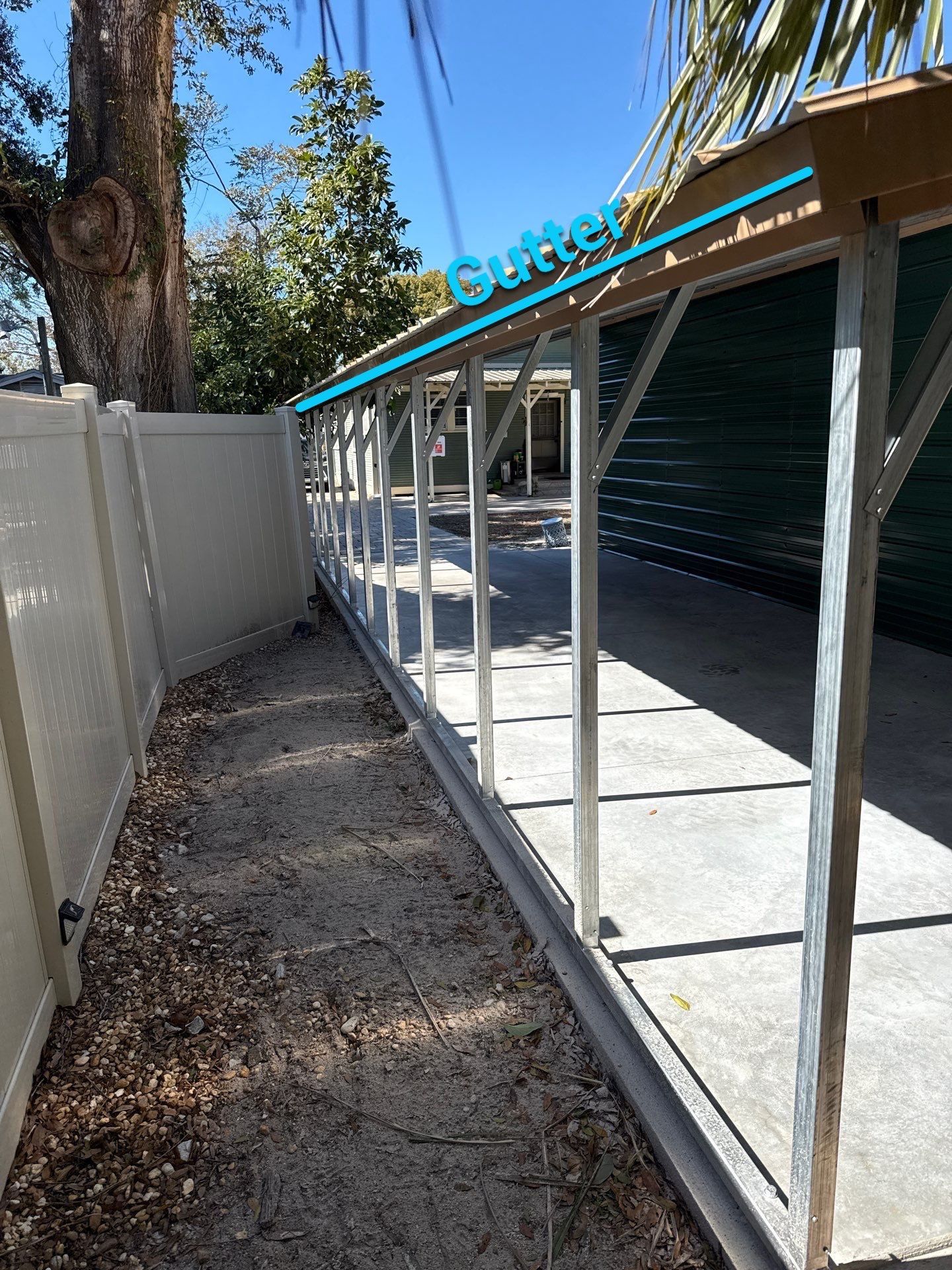 White 6-inch K-style Gutters and Down Spouts using Seamless Gutters White Down Spouts in Tampa FL by Gutter Professors