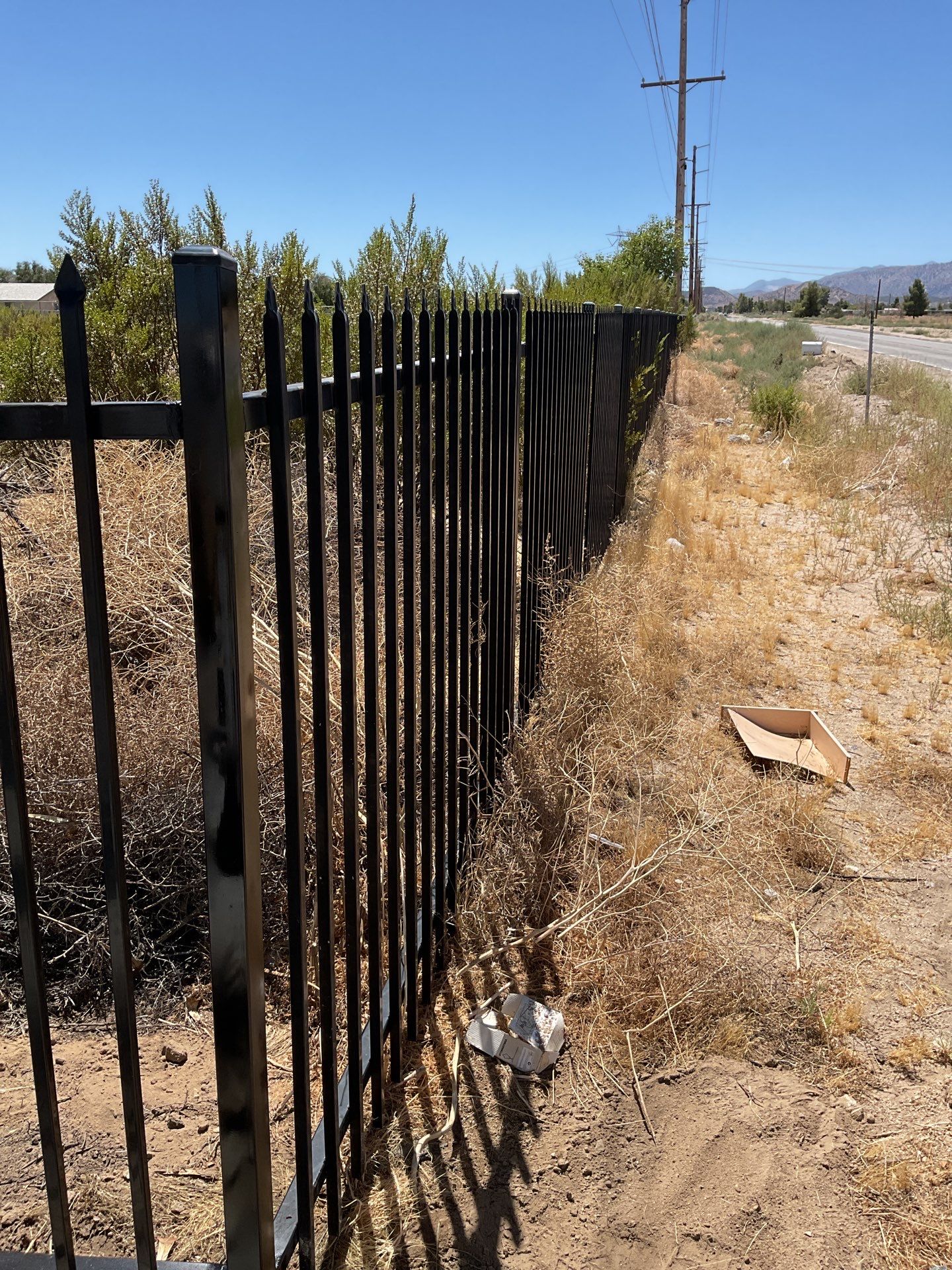 Gate installation using Wrought Iron by Fence Guys Inc. 