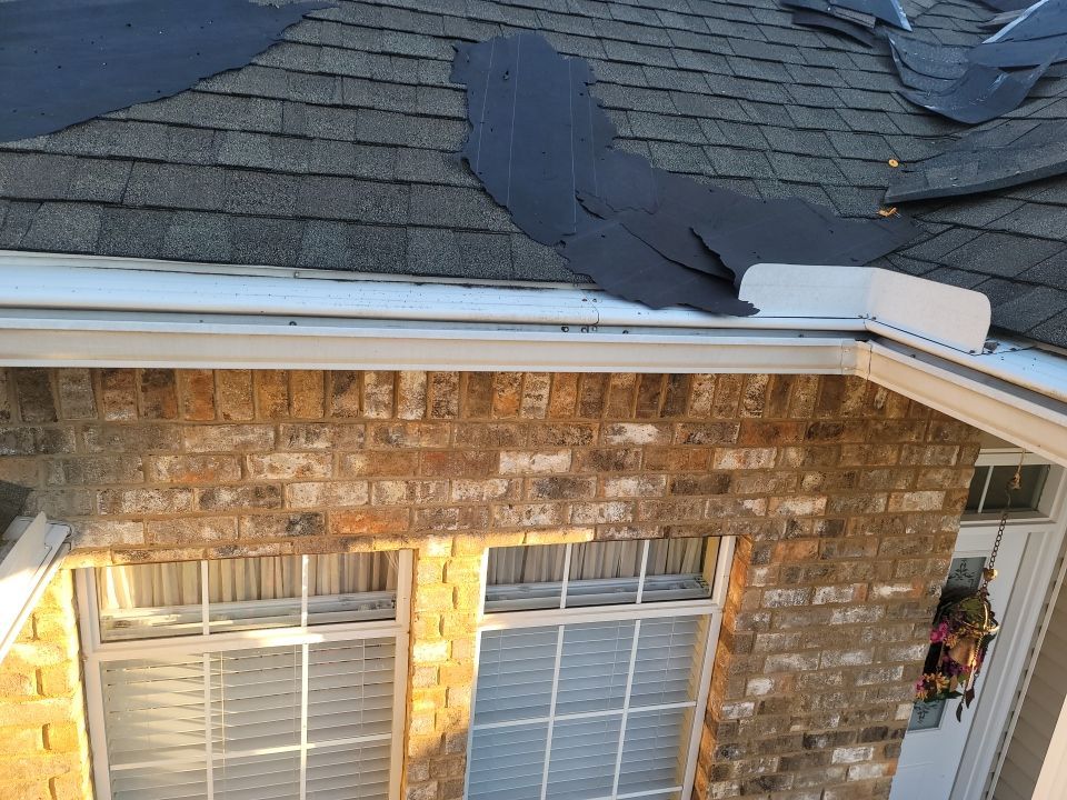 Residential Roofing Installation using Roof Replacement by American Roofing & Construction LLC
