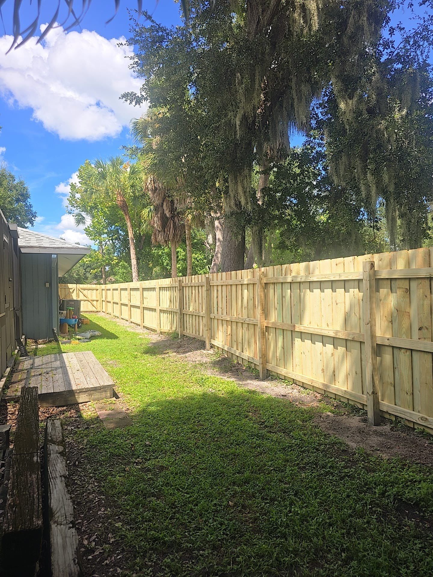 Wood Privacy Fence Installation with Double Gate in Port Charlotte by True Fence LLC